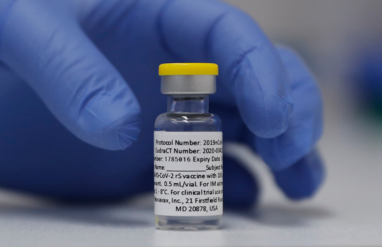 A vial of the Phase 3 Novavax coronavirus vaccine is seen ready for use in the trial at St. George's University hospital in London Wednesday, October 7, 2020. 