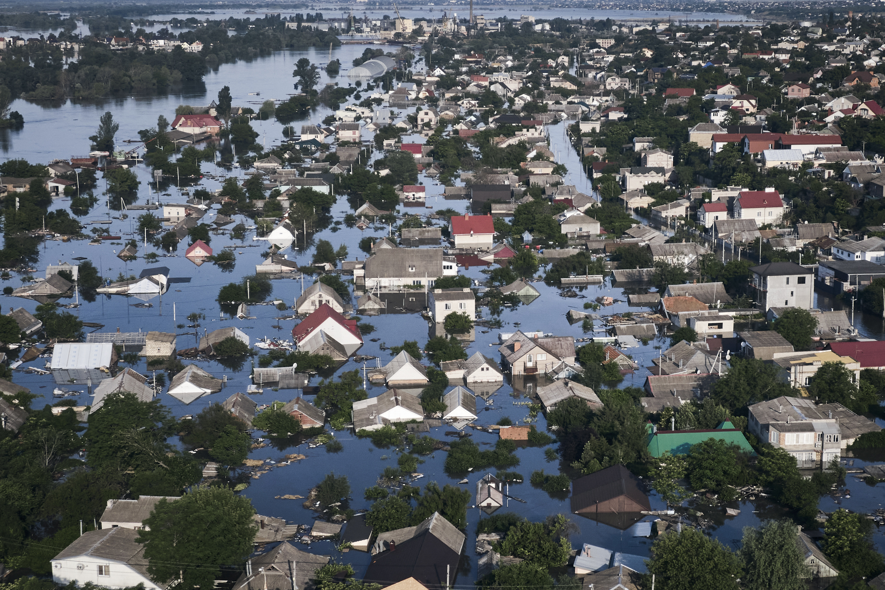 A flooded neighborhood is seen in Kherson, Ukraine, on Wednesday, June 7, after the collapse of the Nova Kakhovka dam. 