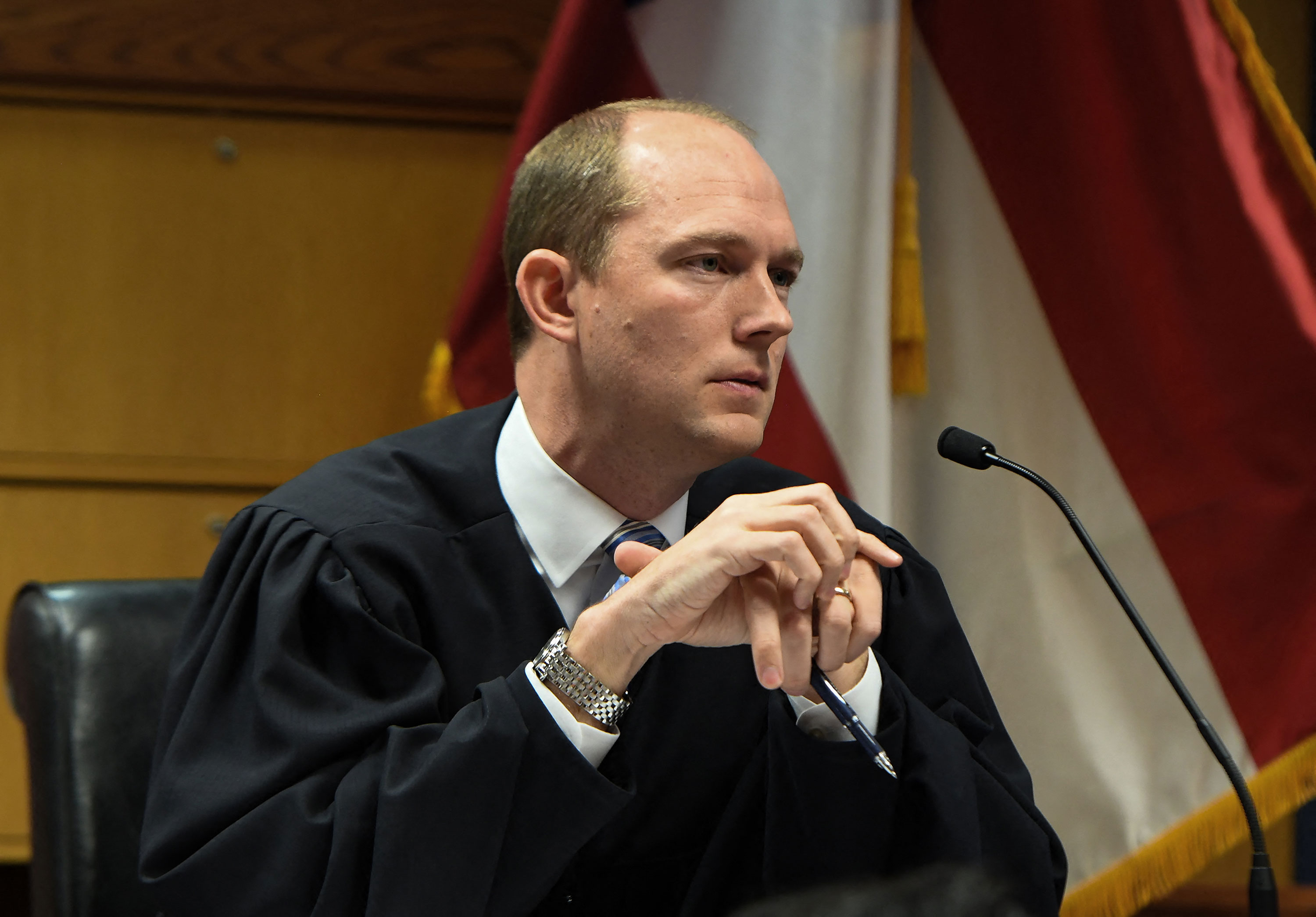 Fulton County Superior Judge Scott McAfee presides over the hearing at the Fulton County Courthouse in Atlanta on Thursday.