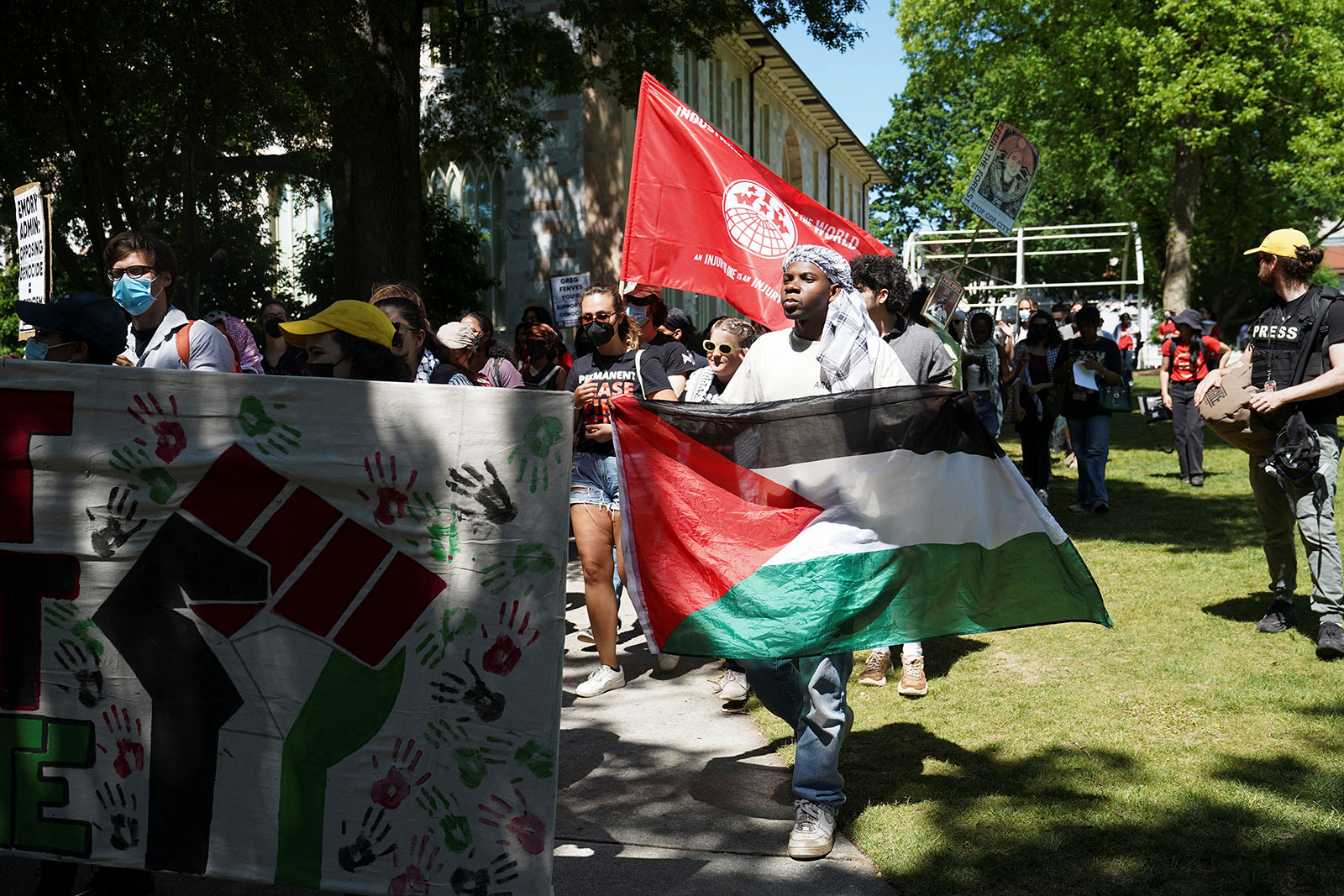 Protesters march to an admissions building at Emory University, in Atlanta, Georgia, on Wednesday, May 1.