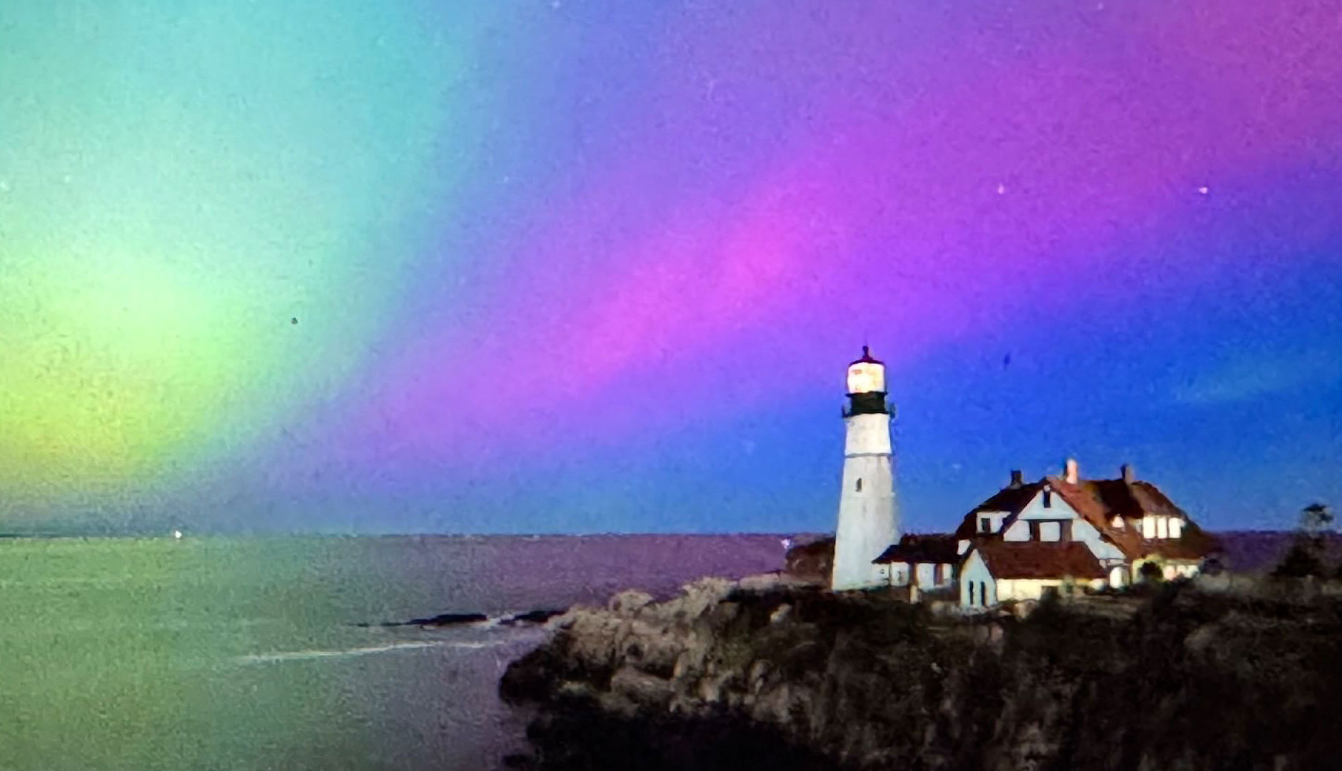 A long-exposure photo shows the aurora borealis over Portland, Maine, on May 10. 