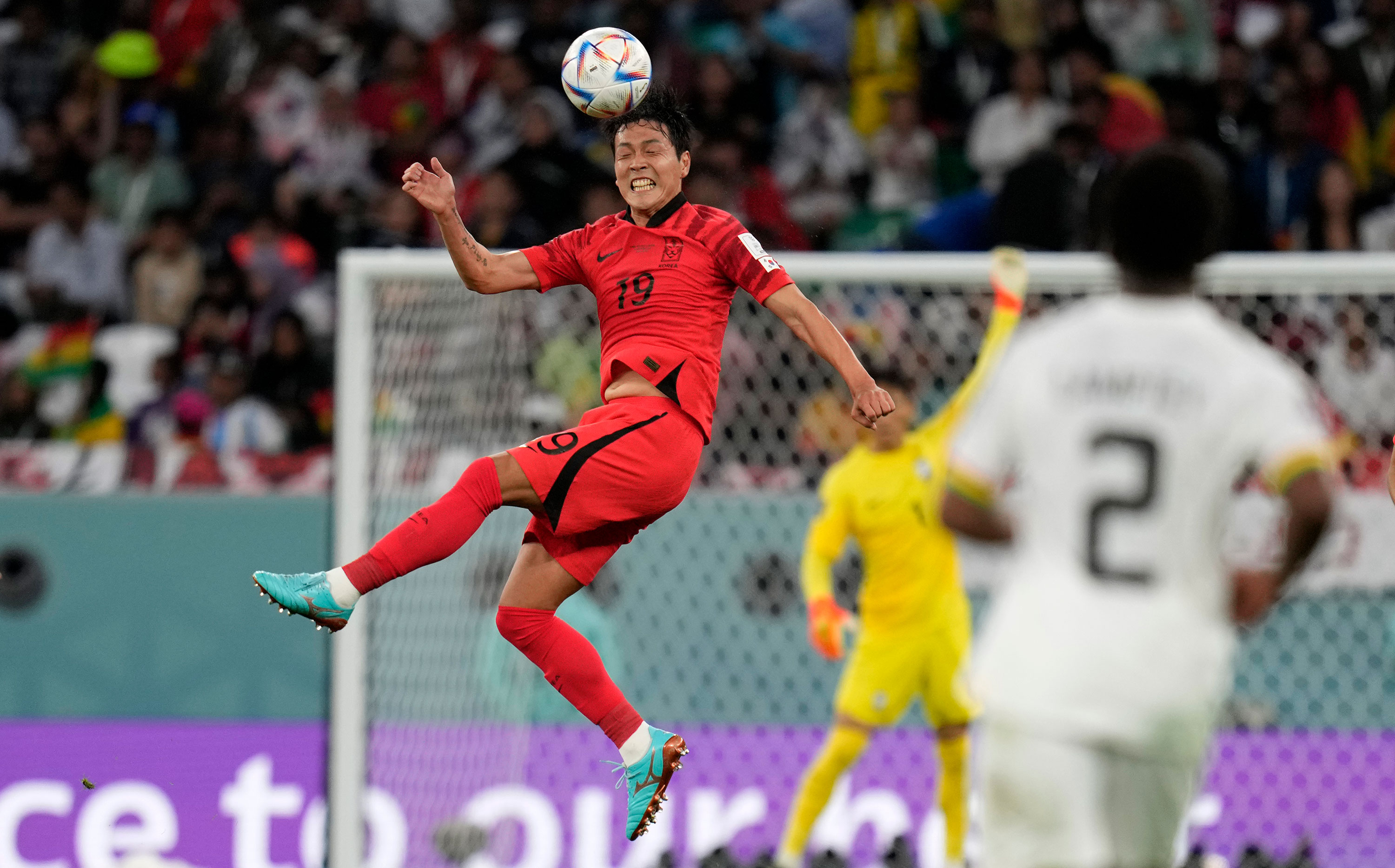 South Korea's Kim Young-gwon heads the ball during the match against Ghana on Monday.