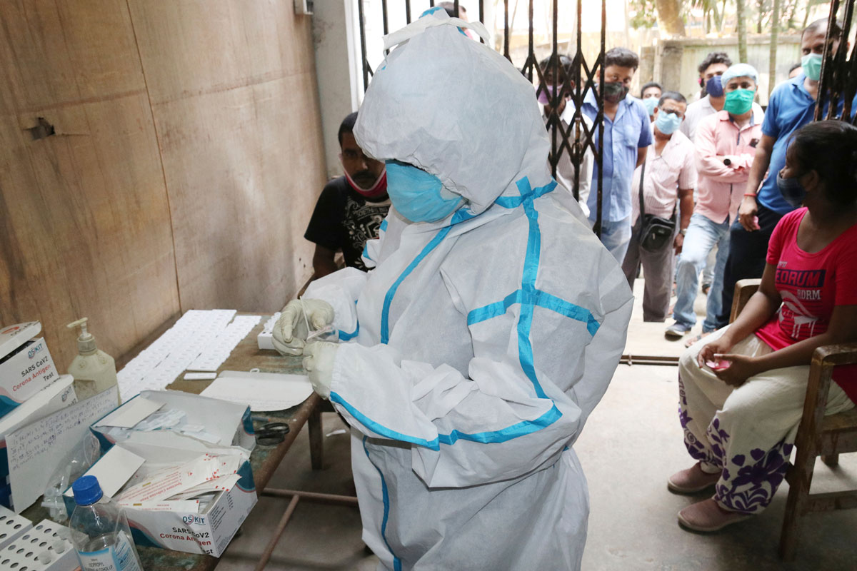 Health care workers test for Covid-19 at North 24 Parganas district in West Bengal, India on May 8.