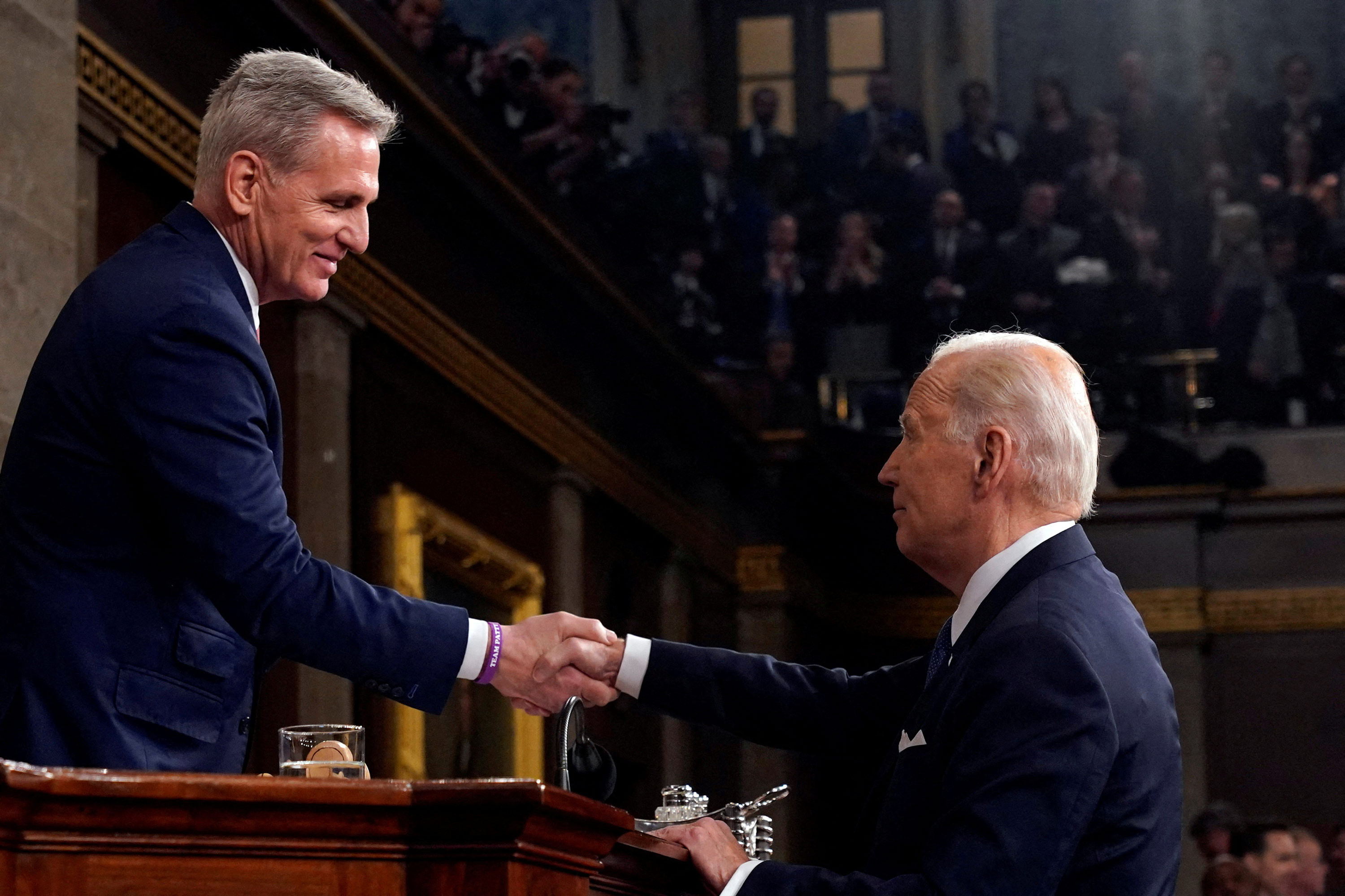 U.S. President Joe Biden shakes hands with U.S. House Speaker Kevin McCarthy after the State of the Union address to a joint session of Congress at the Capitol on Feb. 7, 2023, in Washington, DC.