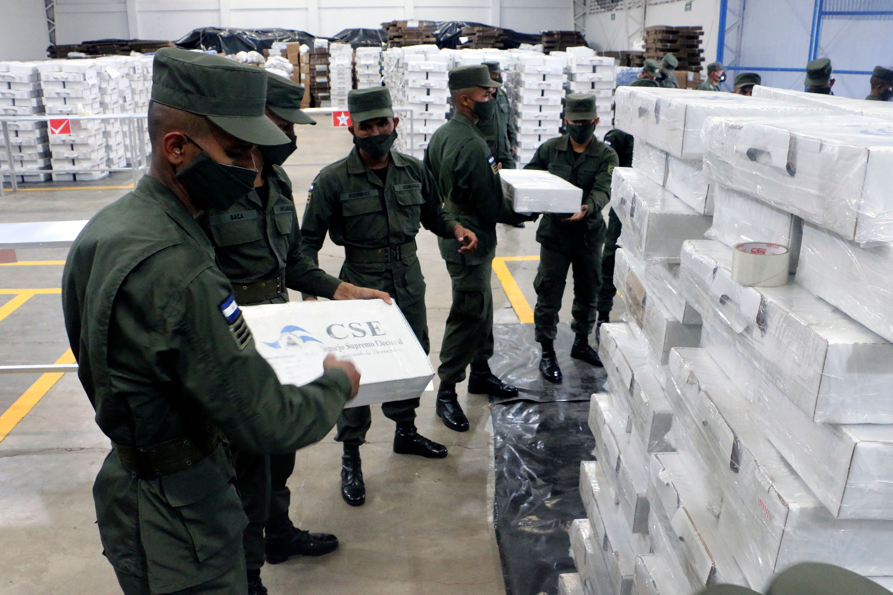 Members of Nicaragua's army prepare election ballots in Managua, on November 1. 