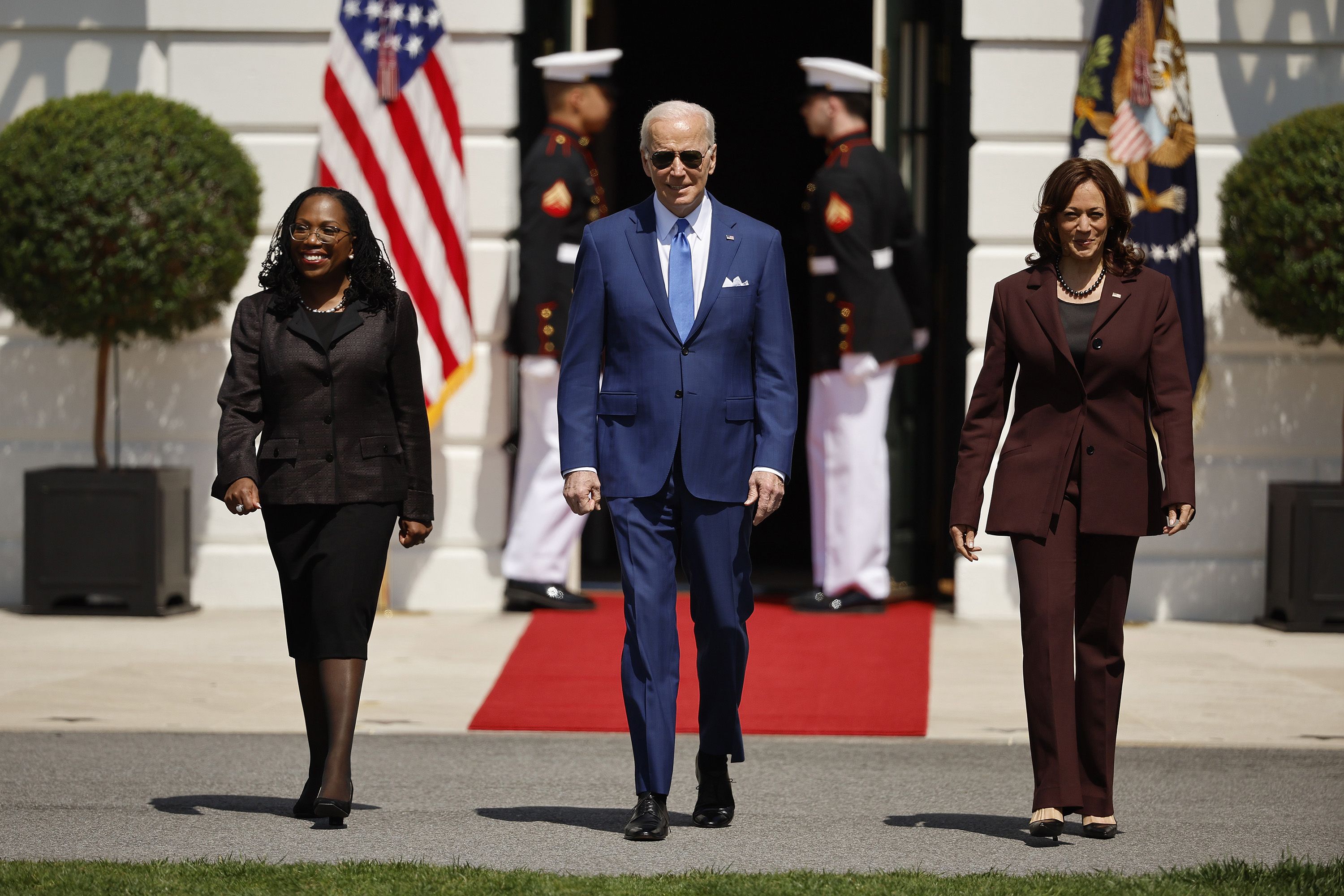 Judge Ketanji Brown Jackson, President Joe Biden and Vice President Kamala Harris walk out of the White House for an event celebrating Jackson's confirmation to the U.S. Supreme Court on the South Lawn on April 8, in Washington, DC.