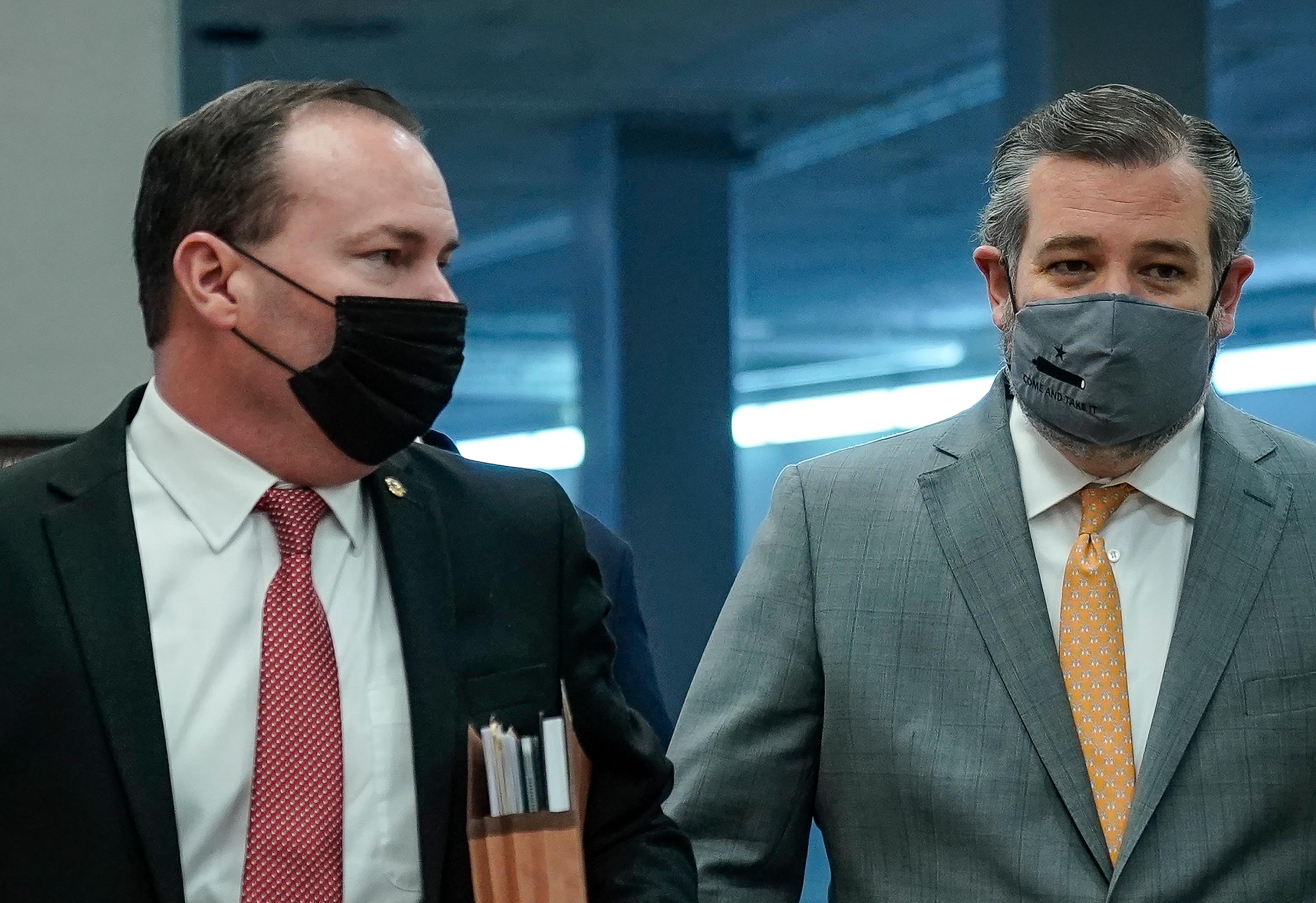 Sen. Mike Lee (R-UT) and Sen. Ted Cruz (R-TX) walk through the Senate subway on their way to the second day of former President Donald Trump's second impeachment trial at the U.S. Capitol on Wednesday, February 10.