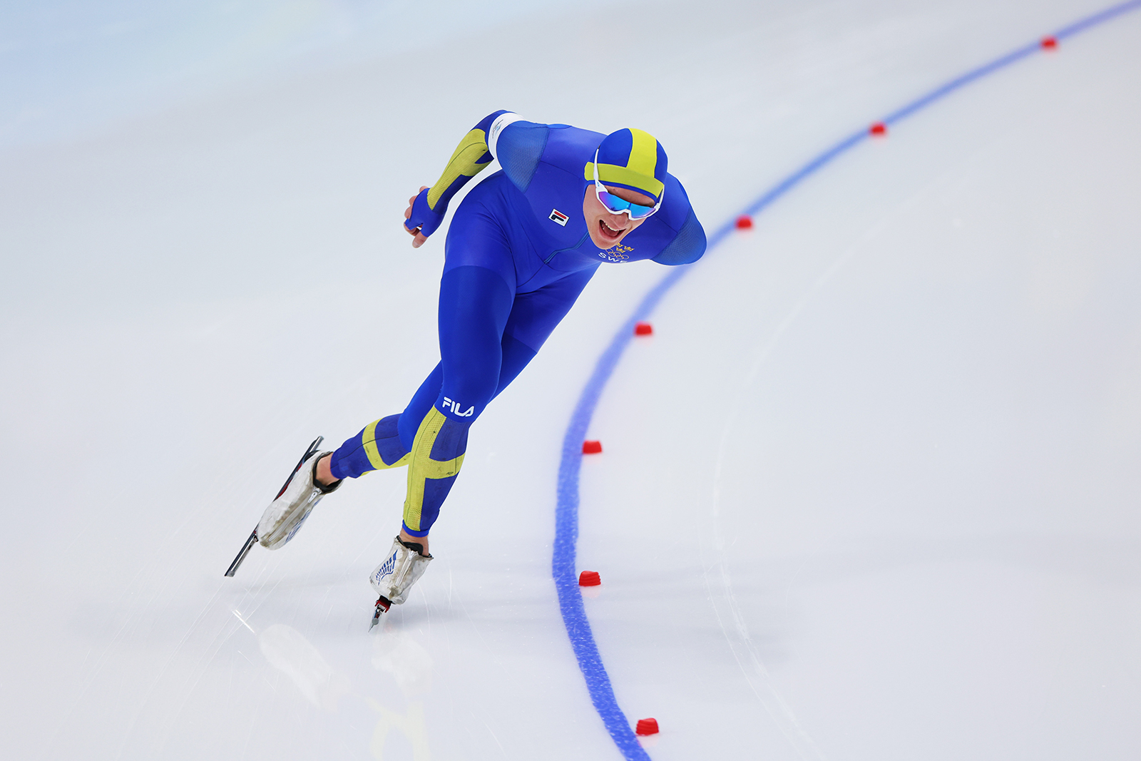 Nils Van Der Poel of Team Sweden skates on February 11.
