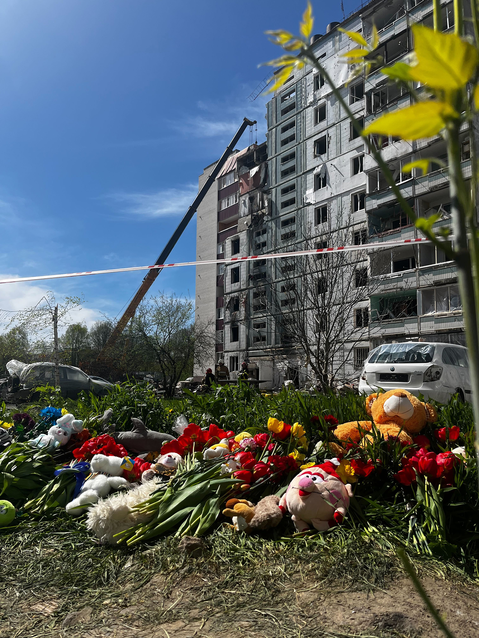 Residents create a makeshift memorial near the site of a Russian missile strike in Uman, Ukraine.