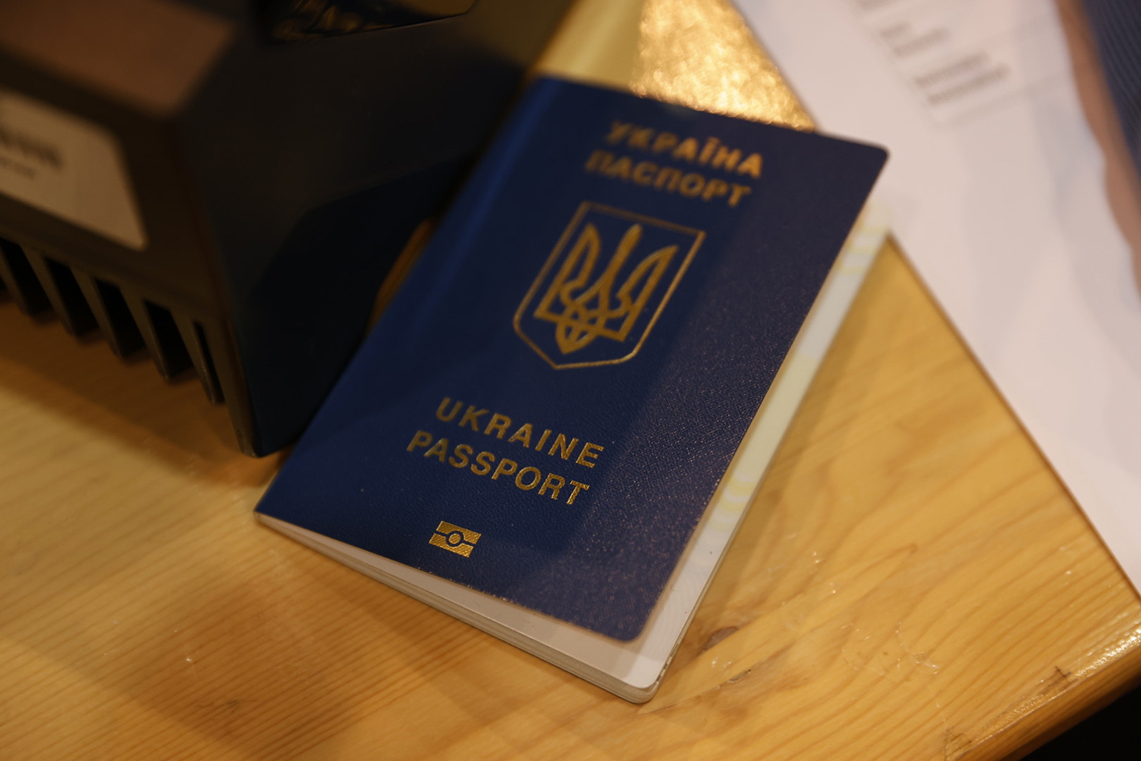 A Ukrainian passport is shown at a center for the registration of Ukrainian refugees, at the Palace 8 hall of Brussels Expo on March 14. 