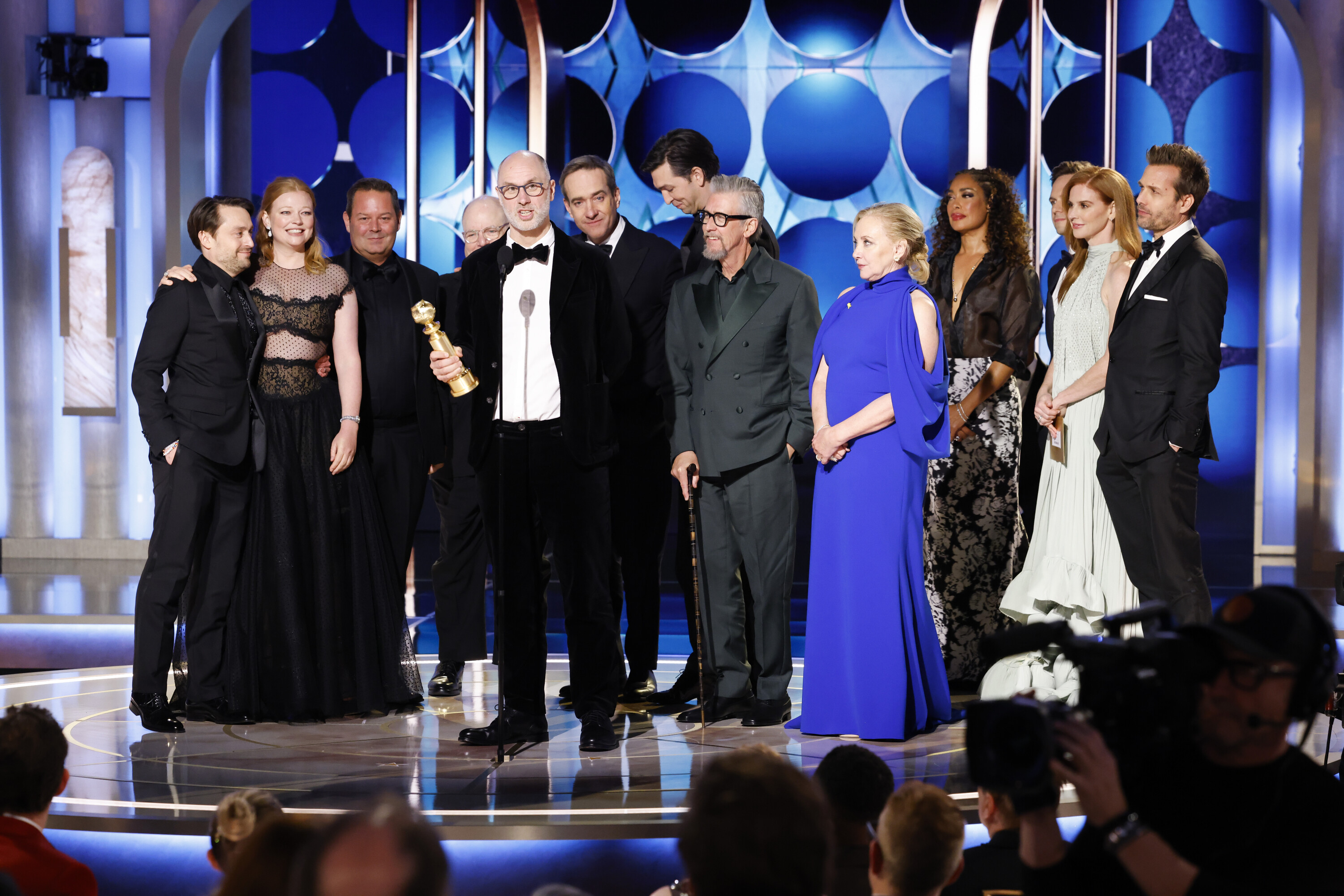 “Succession” creator Jesse Armstrong gives an acceptance speech with the cast of the show. 