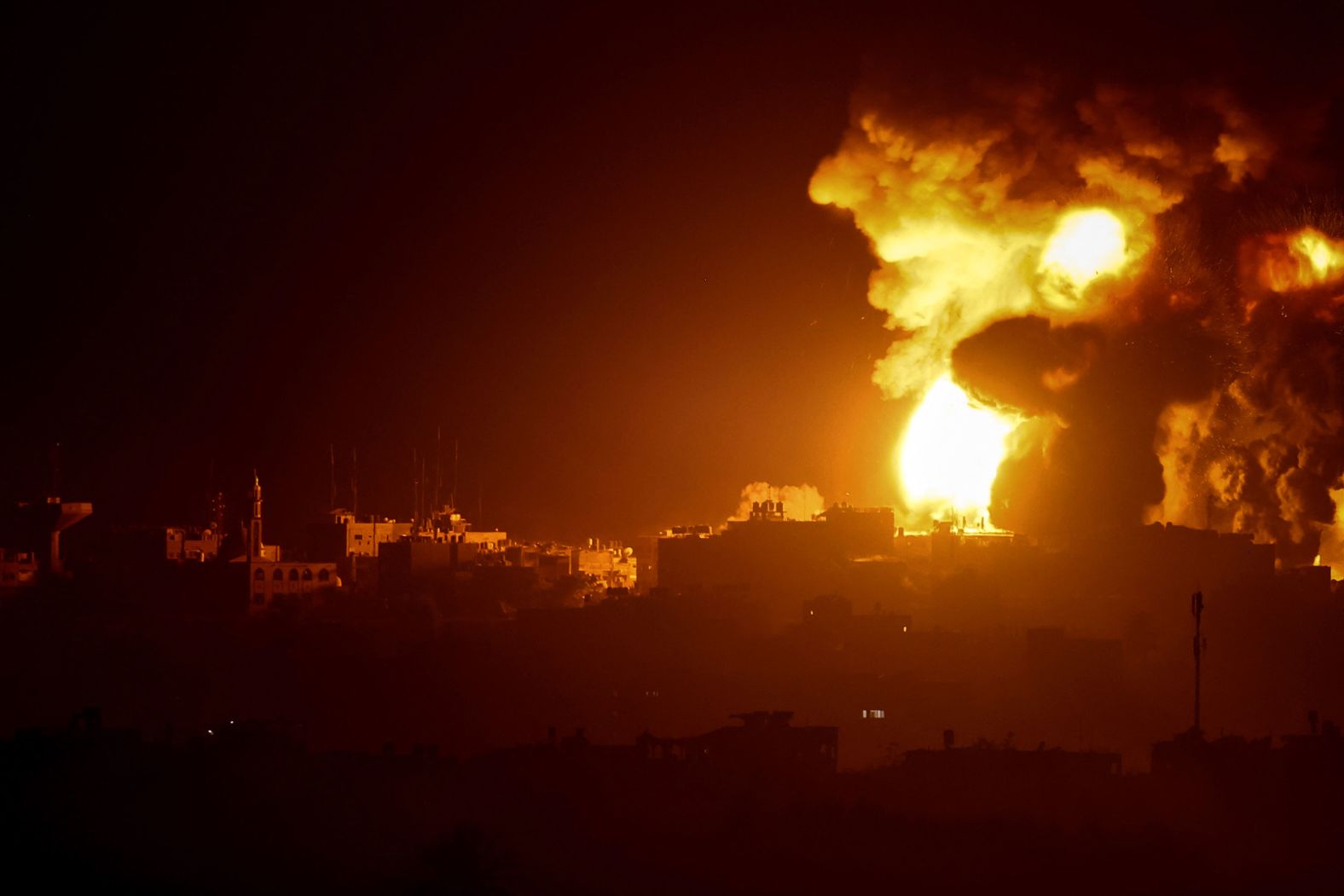 A fireball erupts during Israeli bombardment of Gaza, as seen from Israel, on November 9.