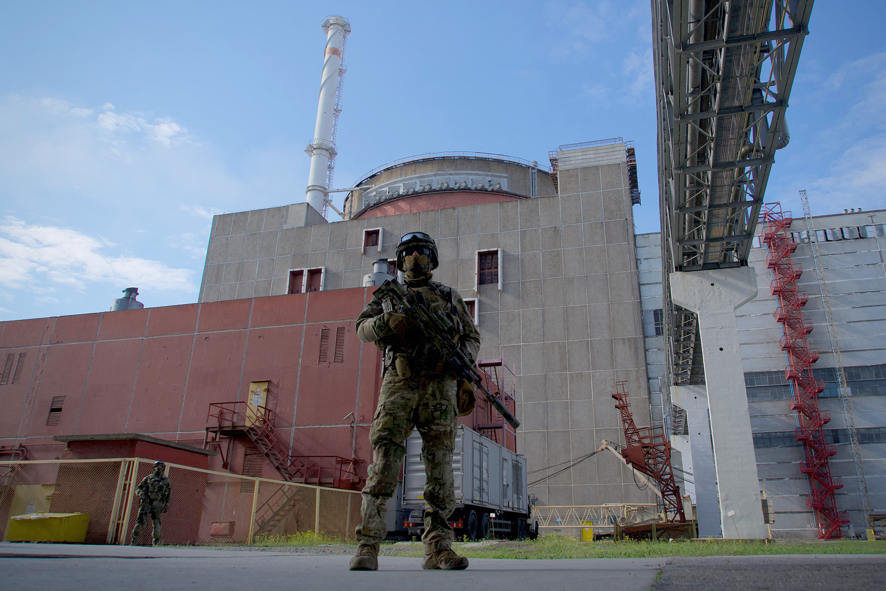 A Russian serviceman stands guard outside the second reactor of the Zaporizhzhia Nuclear Power Station, Ukraine, on May 1.
