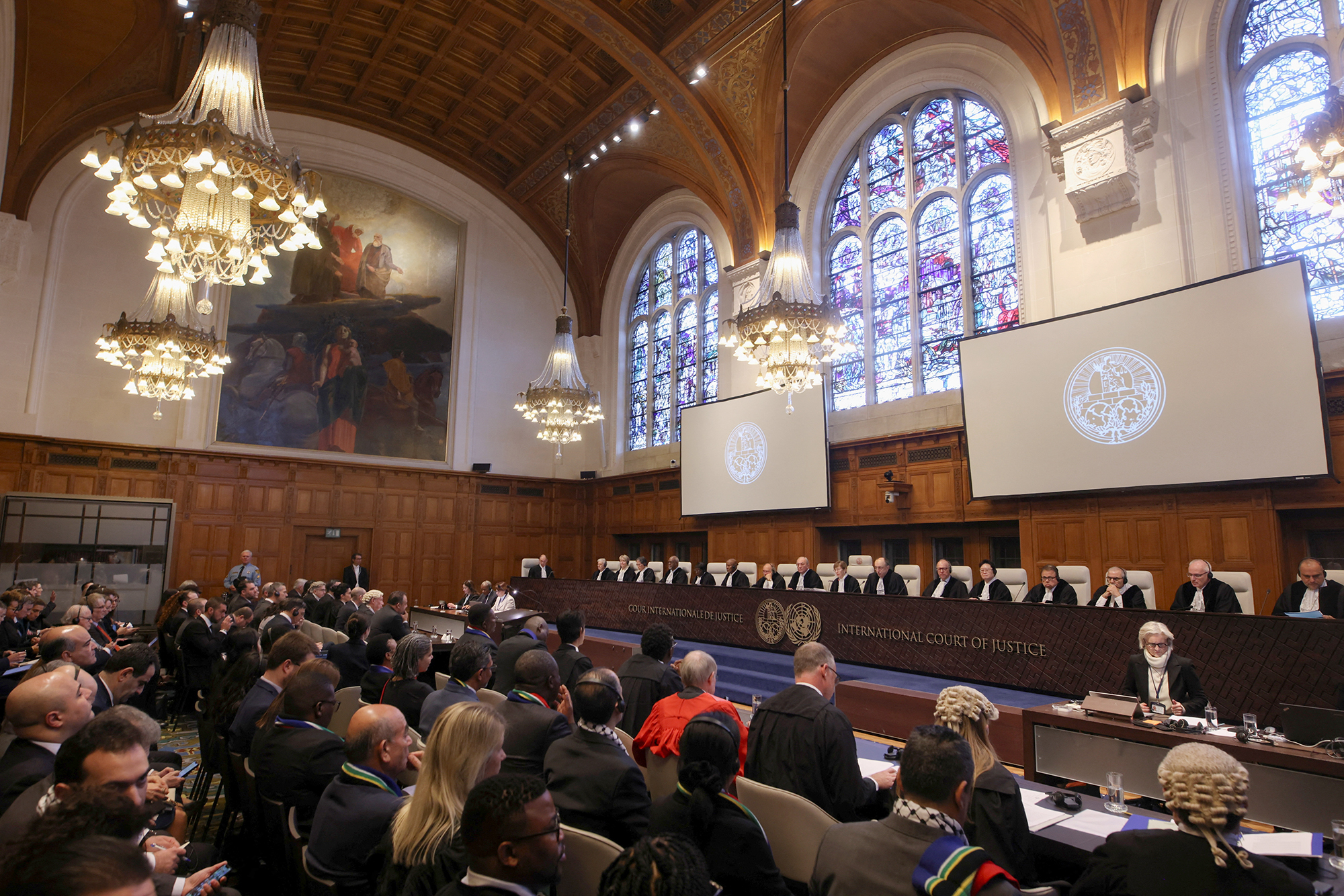 People sit inside the International Court of Justice (ICJ) in The Hague, Netherlands, on January 11.