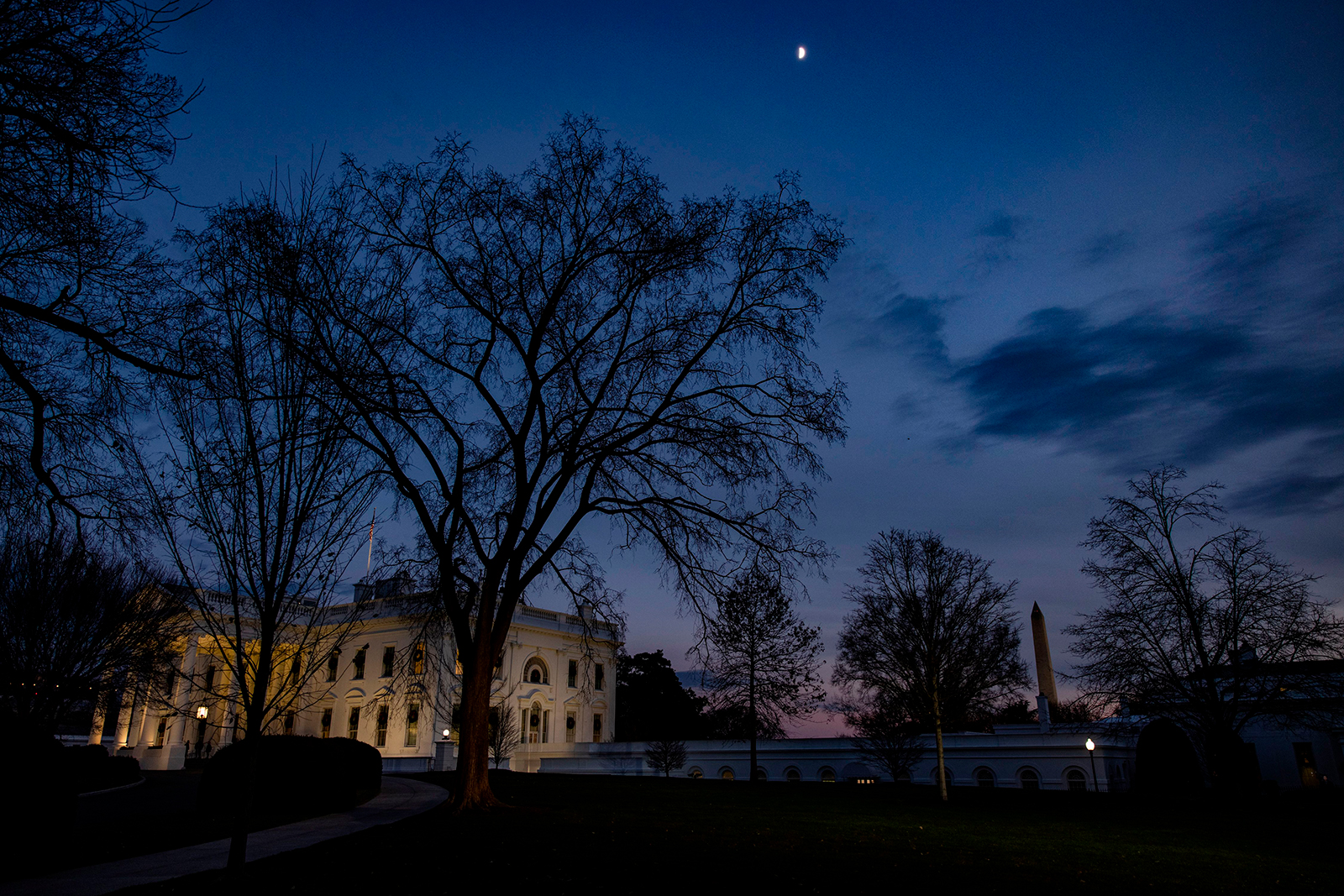 Dusk falls over the White House in Washington, DC on December 21.