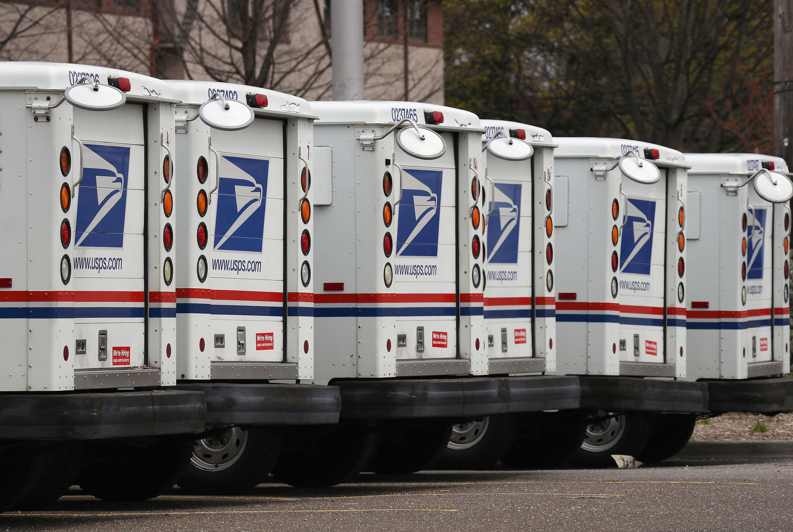 United States Postal Service trucks are seen in April 2020 in Farmingdale, New York.