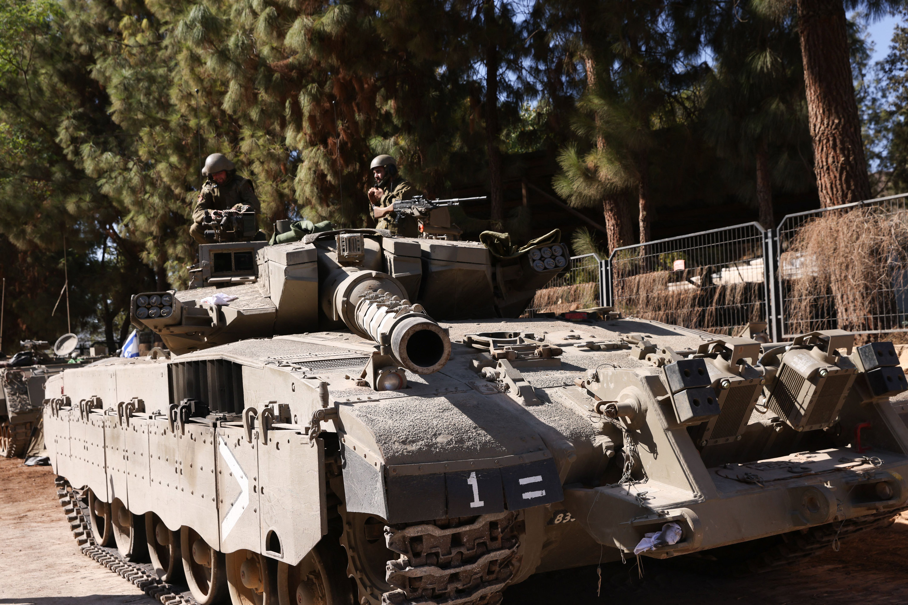 An Israeli army Merkava tank is positioned in the Upper Galilee area near the Lebanon border on October 25.
