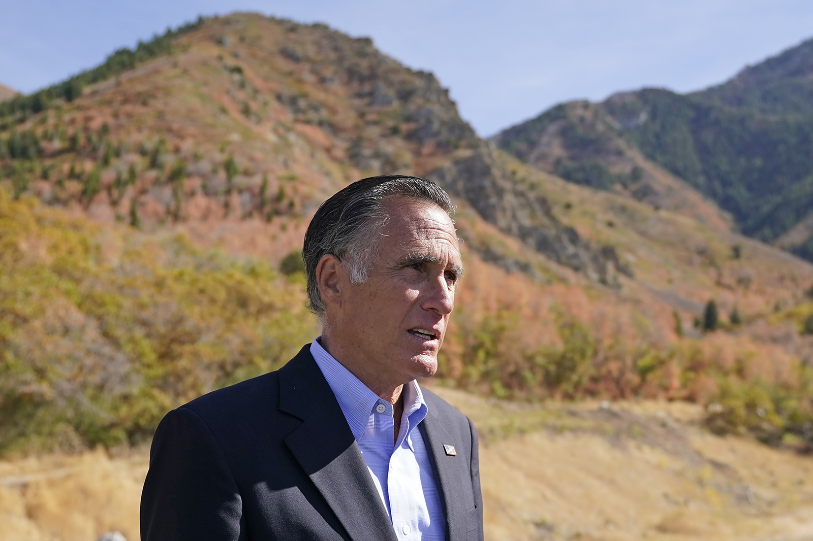 Sen. Mitt Romney, R-Utah, speaks to reporters following a news conference on Thursday, October 15, near Neffs Canyon in Salt Lake City.