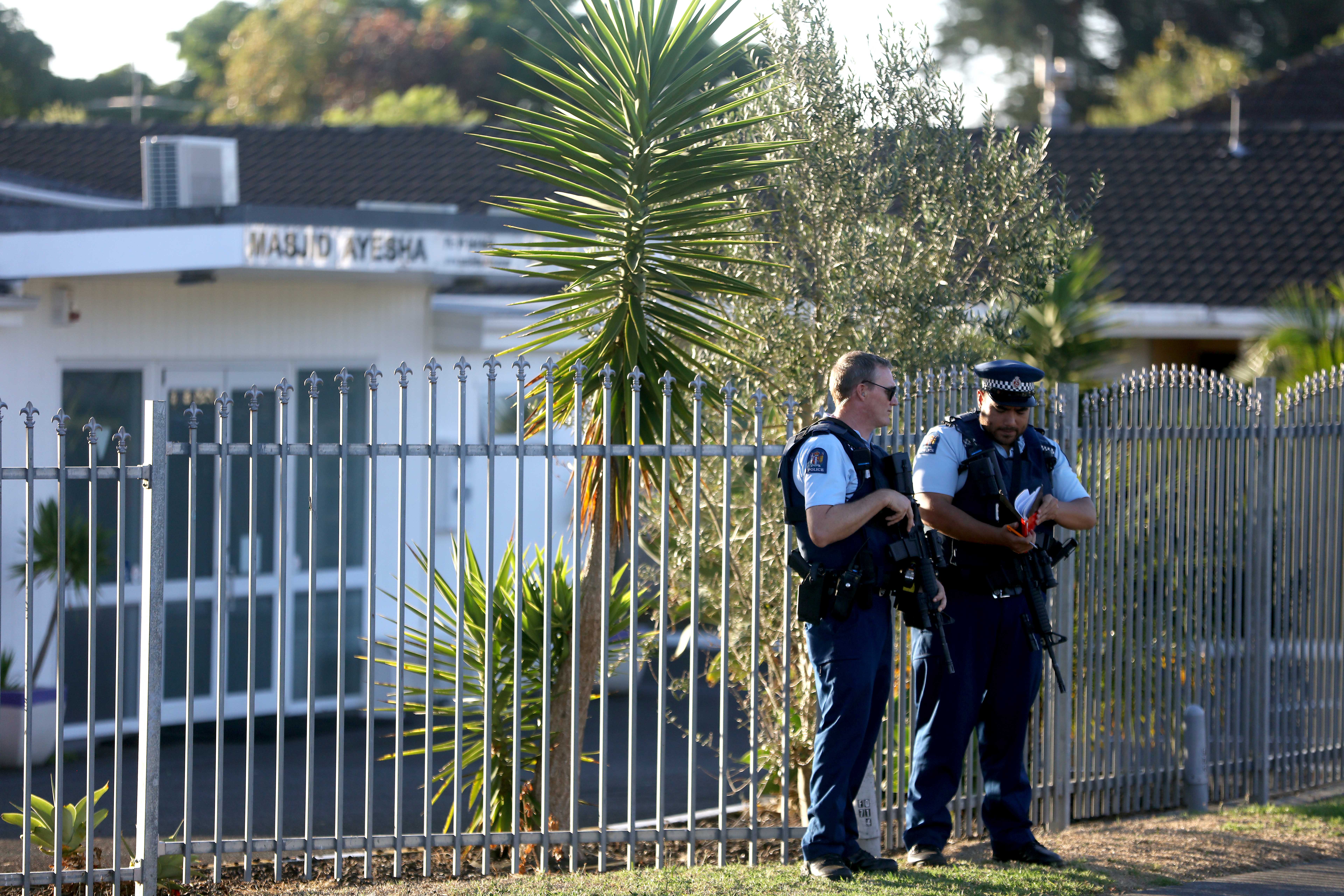  Armed police maintain a presence outside the Masijd Ayesha Mosque in Manurewa on March 15.