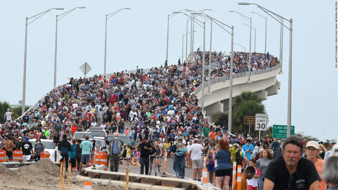 Crowds gathered on a bridge in Titusville, Florida Wednesday to watch the SpaceX launch.