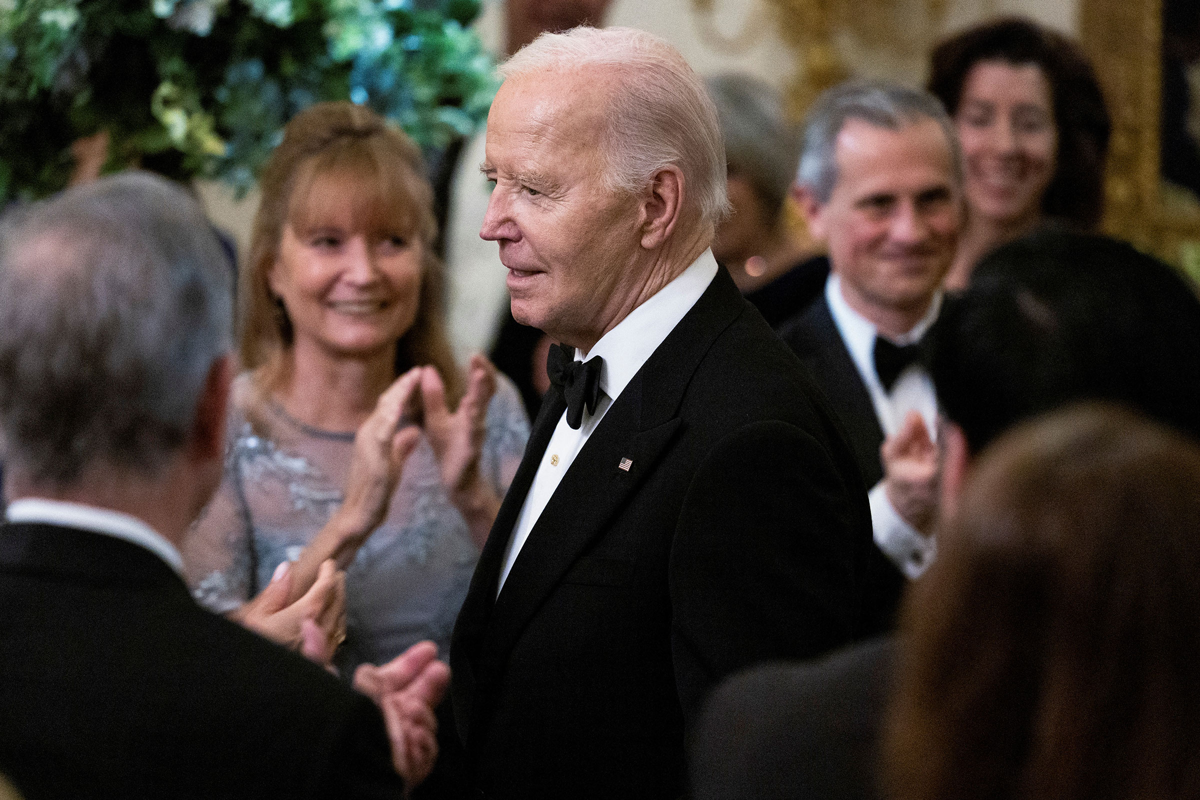 President Joe Biden arrives at a black-tie dinner for US governors attending the National Governors Association winter meeting, at the White House in Washington, DC, on Saturday.