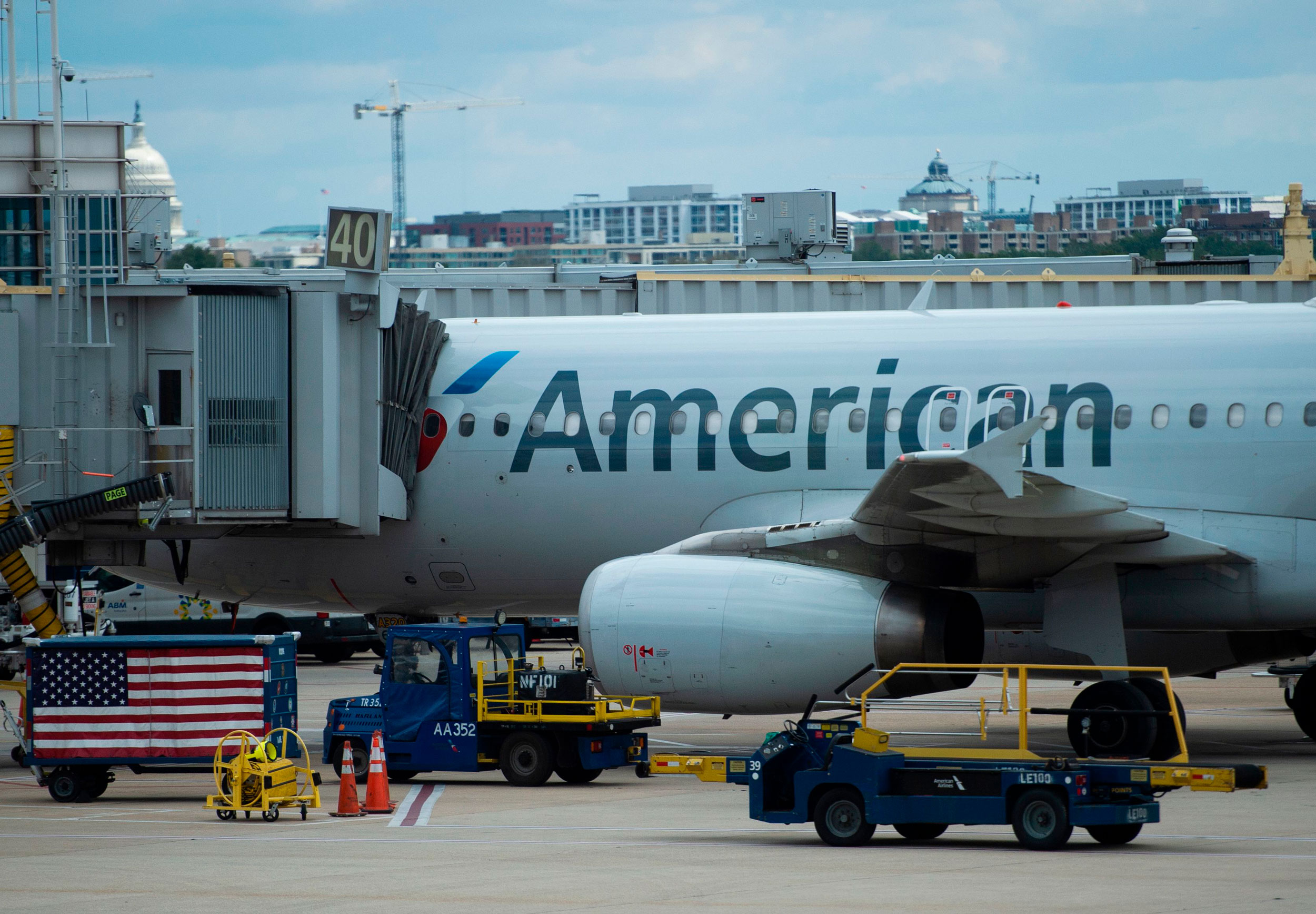 An American Airlines plane is parked at a gate at Ronald Reagan Washington National Airport in Arlington, Virginia, on May 12.