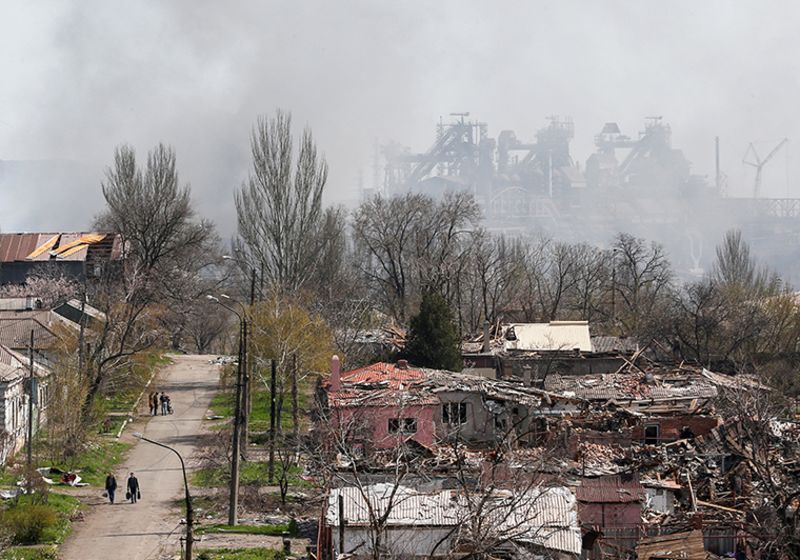 Smoke rises above the Azovstal Iron and Steel Works company and buildings in Mariupol, Ukraine, on Monday, April 18.