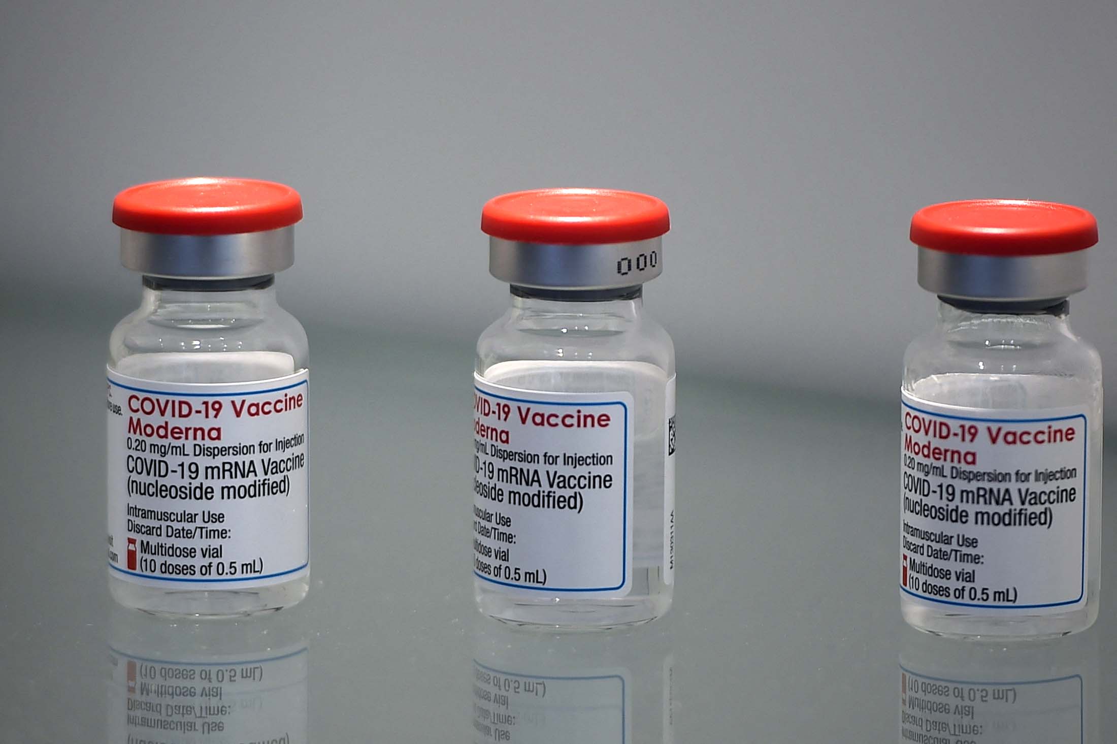 Vials of the Moderna Covid-19 disease vaccine are seen in Monts, France, on April 22. 