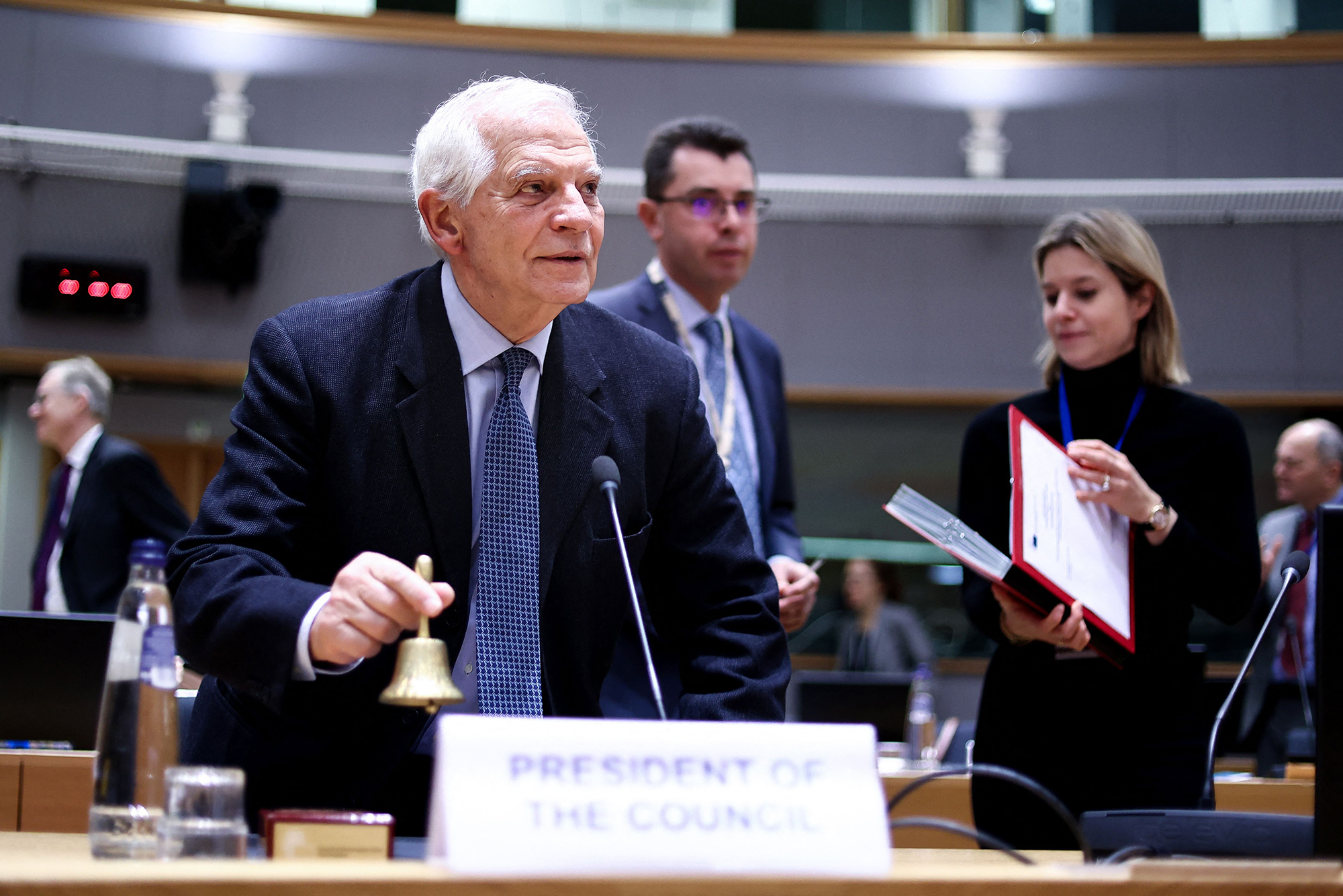 The European Commission's High Representative for Foreign Affairs and Security Policy Josep Borrell rings the bell before a meeting of Foreign Affairs Council at the EU headquarters in Brussels, on February 20.