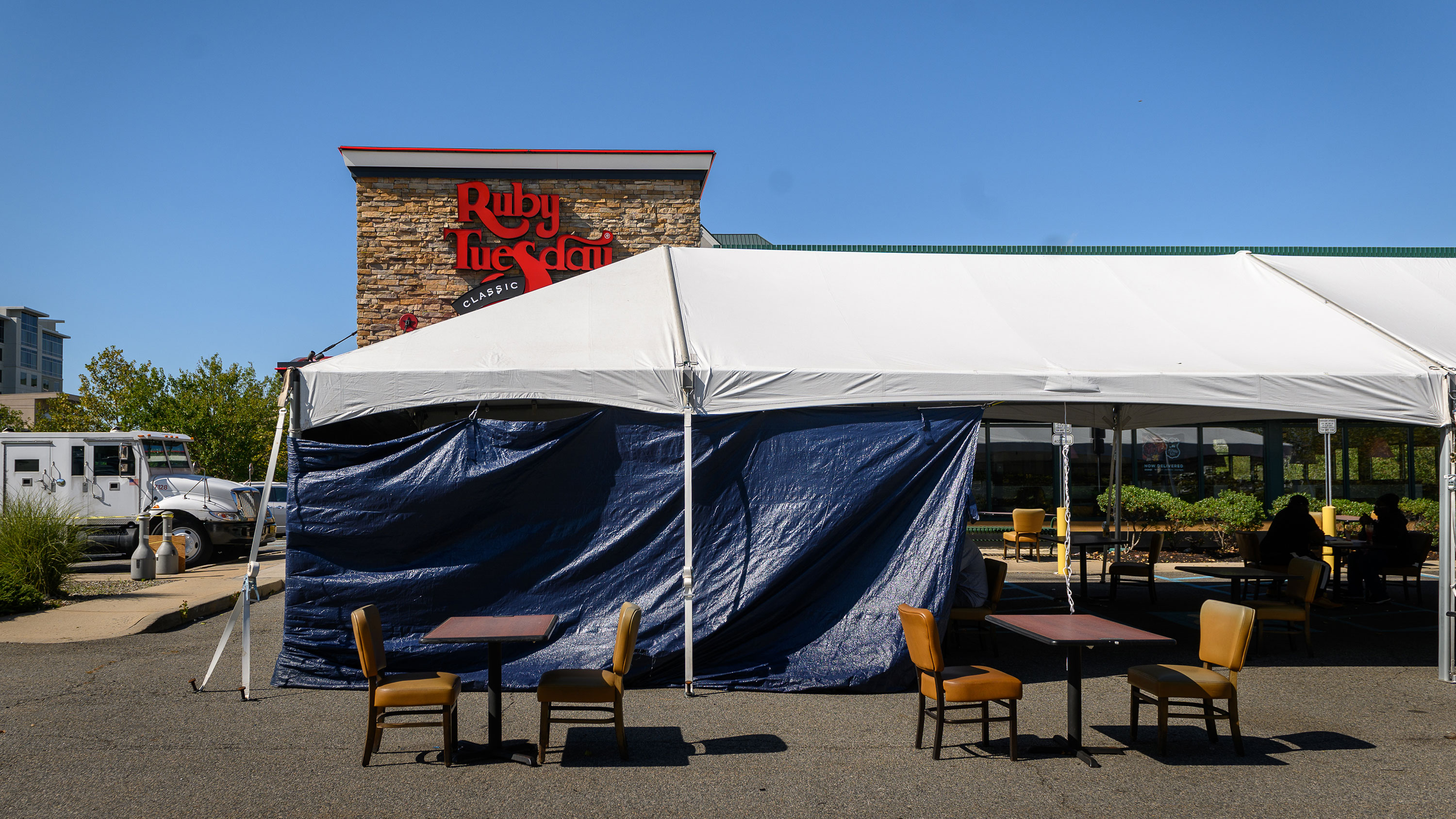 An outdoor dining area is set up outside a Ruby Tuesday restaurant in Elizabeth, New Jersey, on October 9.