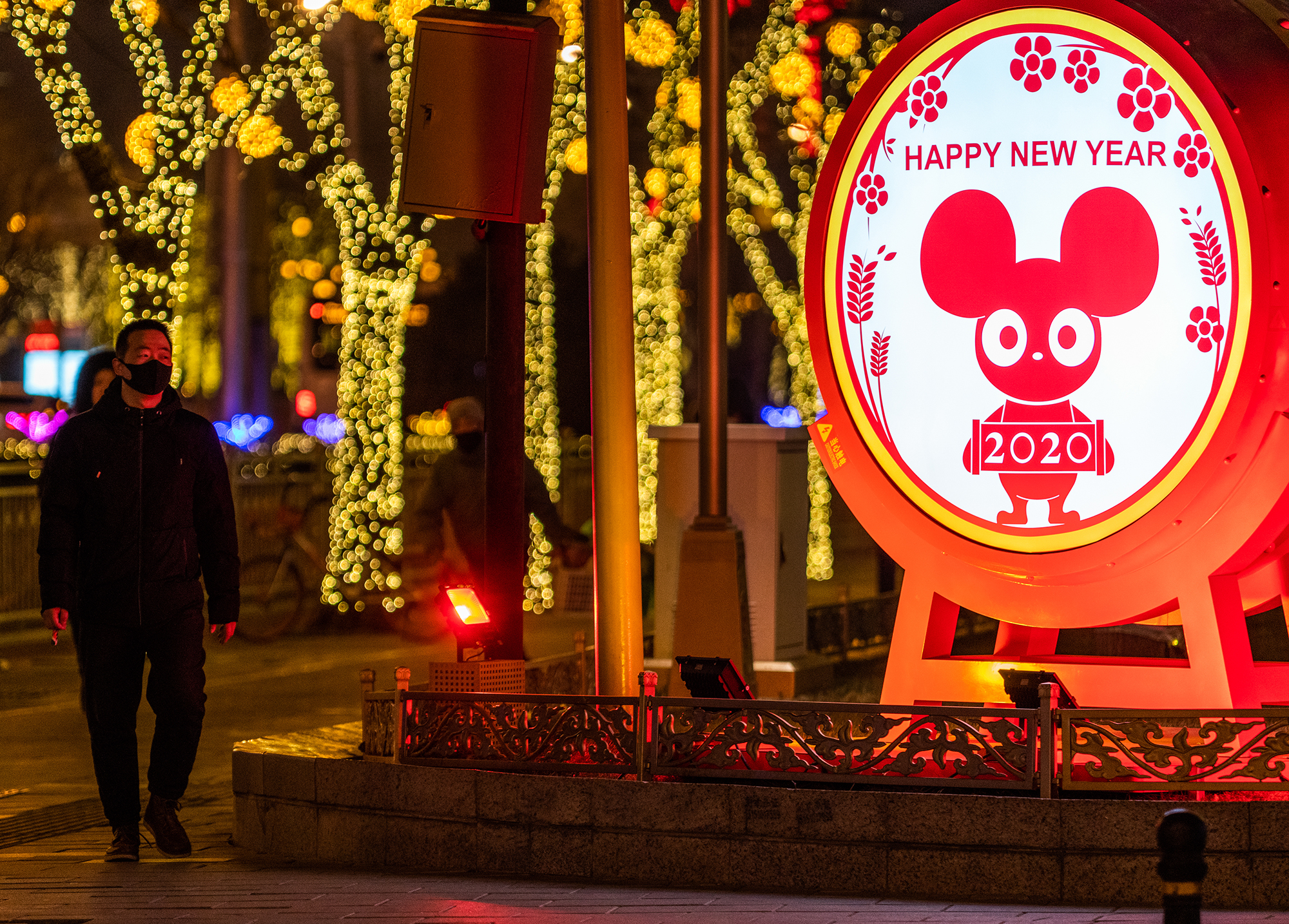 A man wears a face mask in Guomao, central Beijing.