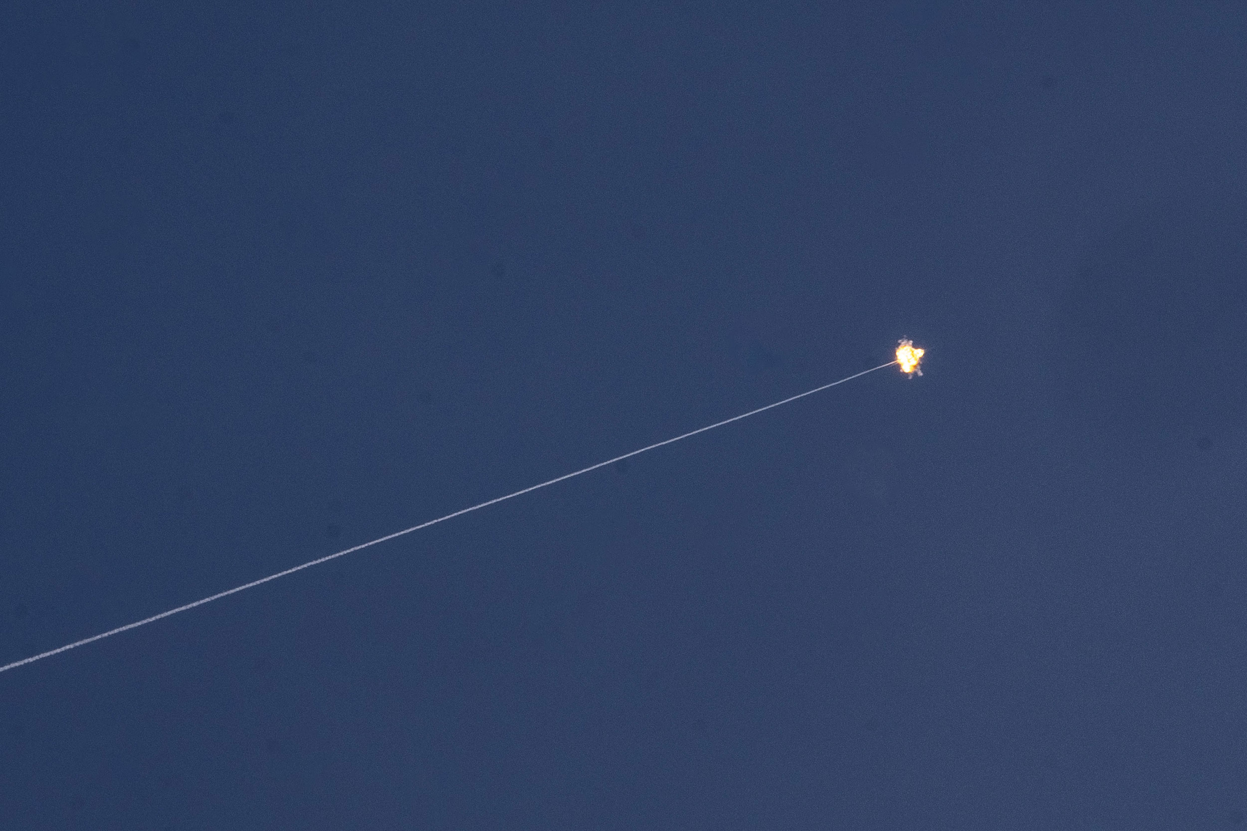 A rocket fired from Gaza is intercepted by Israel's Iron Dome defense system near Kerem Shalom, Israel, on May 7.