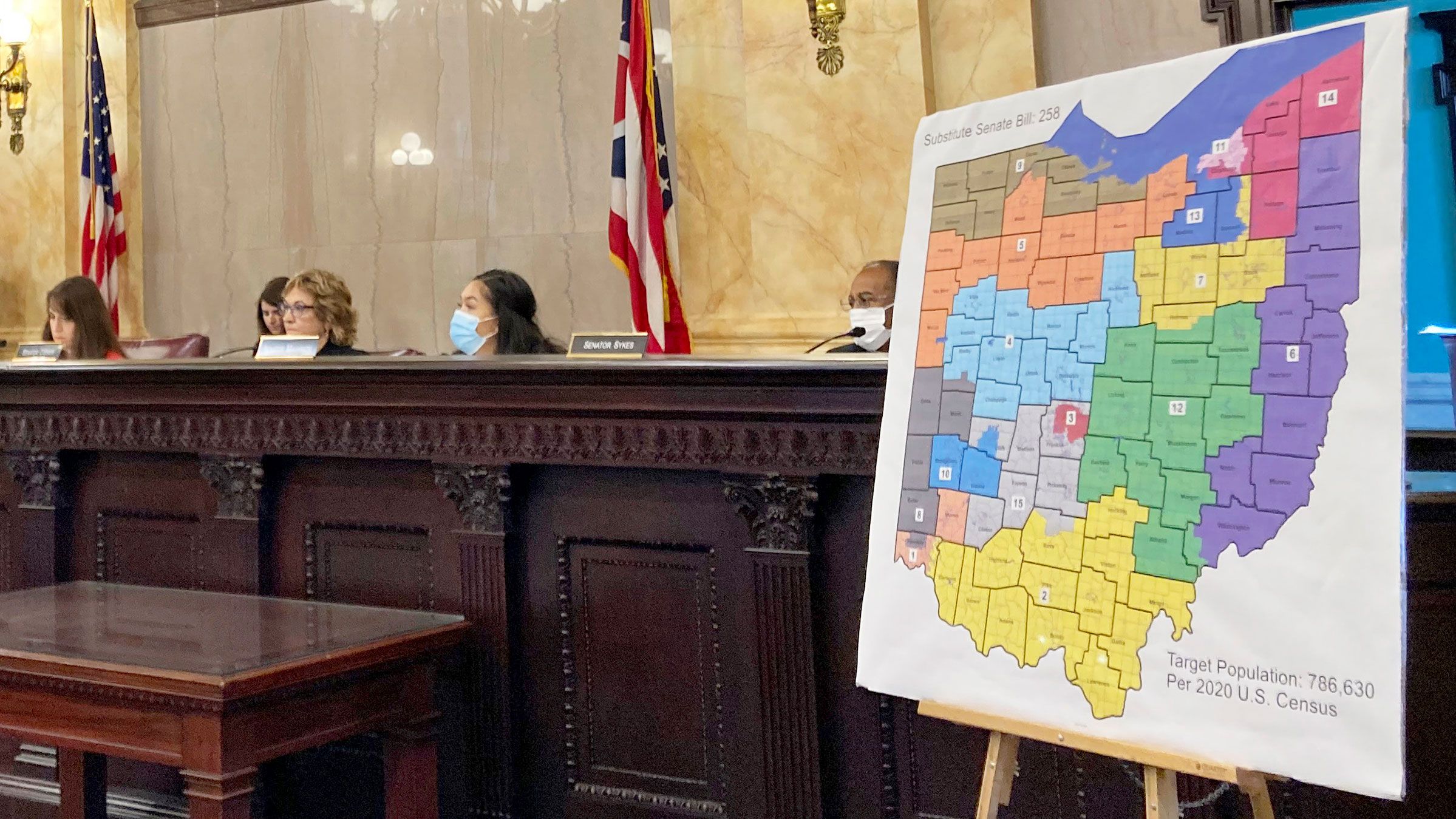 Members of the Ohio Senate Government Oversight Committee hear testimony on a redistricting map in November.