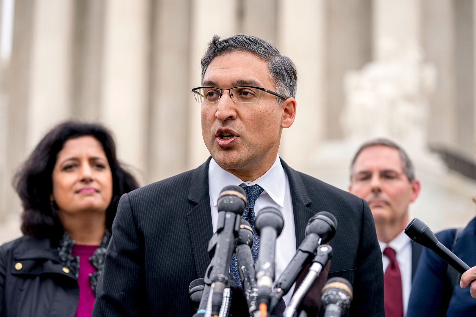 Neal Katyal speaks to members of the media outside the Supreme Court in 2018.