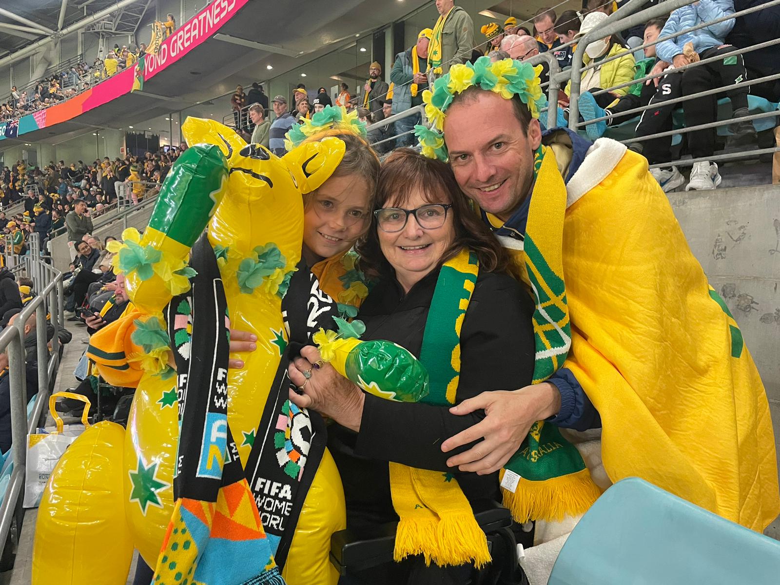 From left to right, Australia fans Maddison, Kerrie and Bradley Beer.