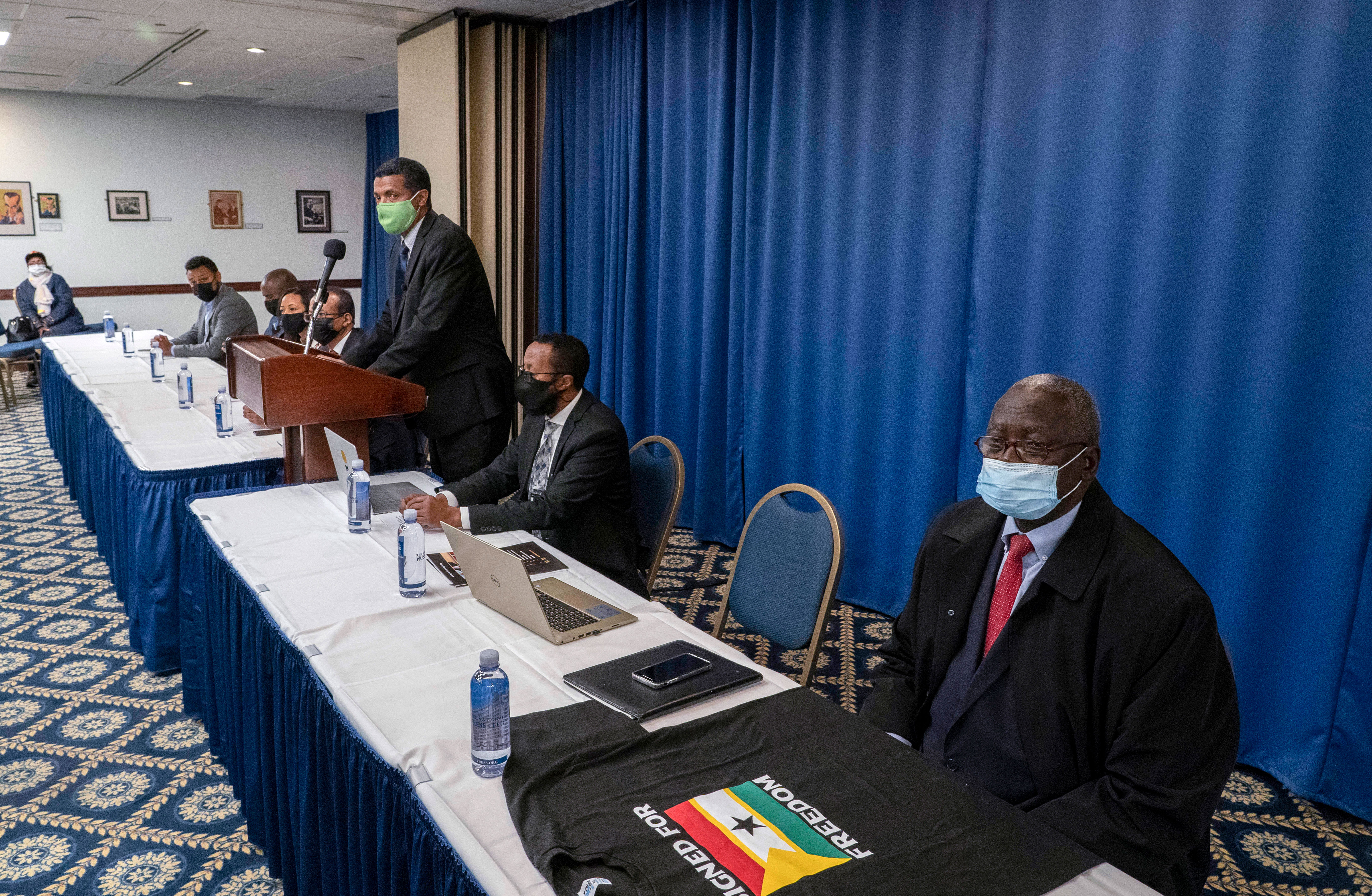 Admassu Tsegaye, center, speaks during a signing ceremony of the United Front of Ethiopian Federalist and Confederalist forces in Washington, DC, on November 5.