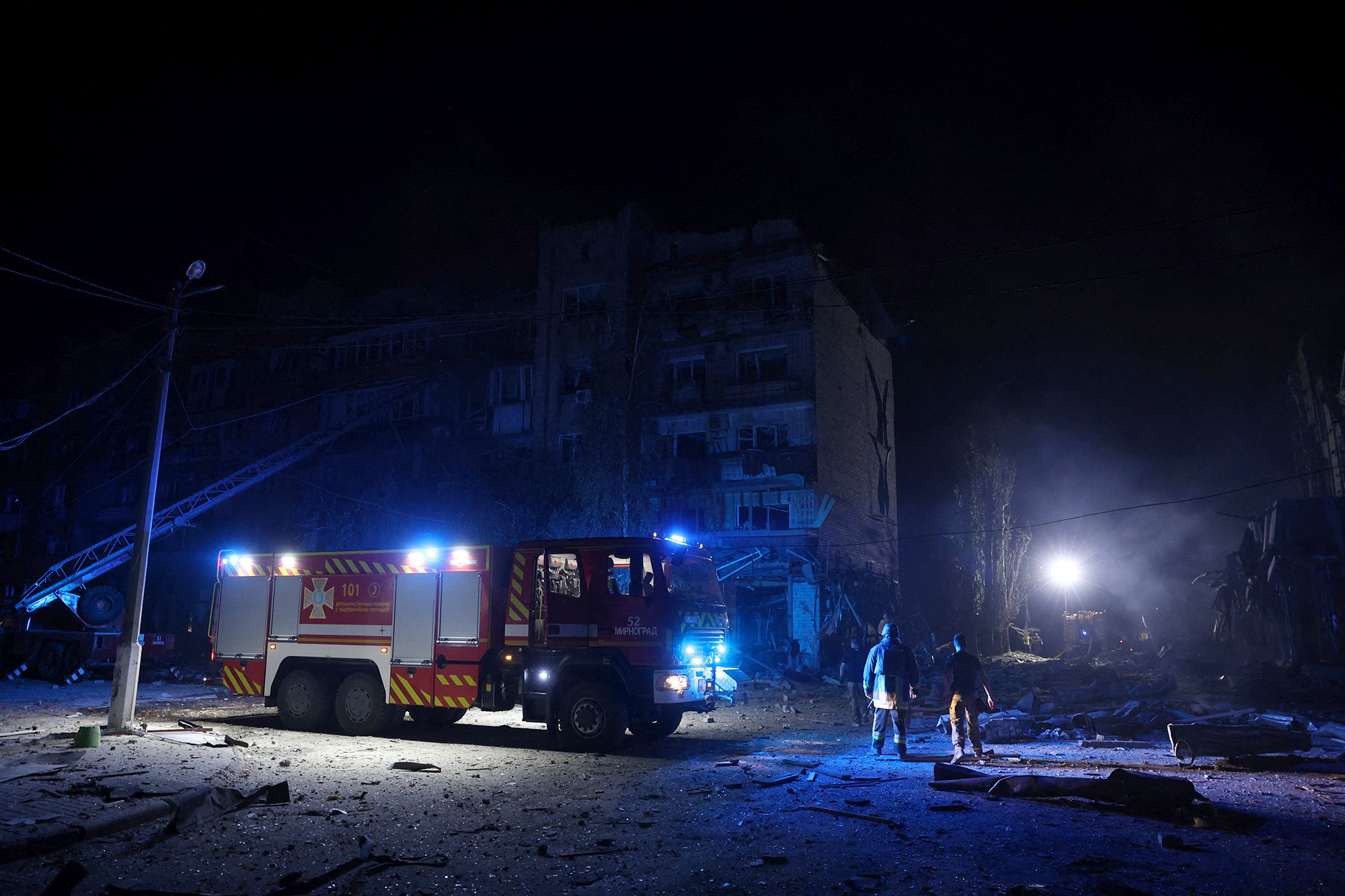 Rescuers are at work near a damaged residential building following Russian missiles strikes in Pokrovsk, Donetsk region, Ukraine, on August 7.