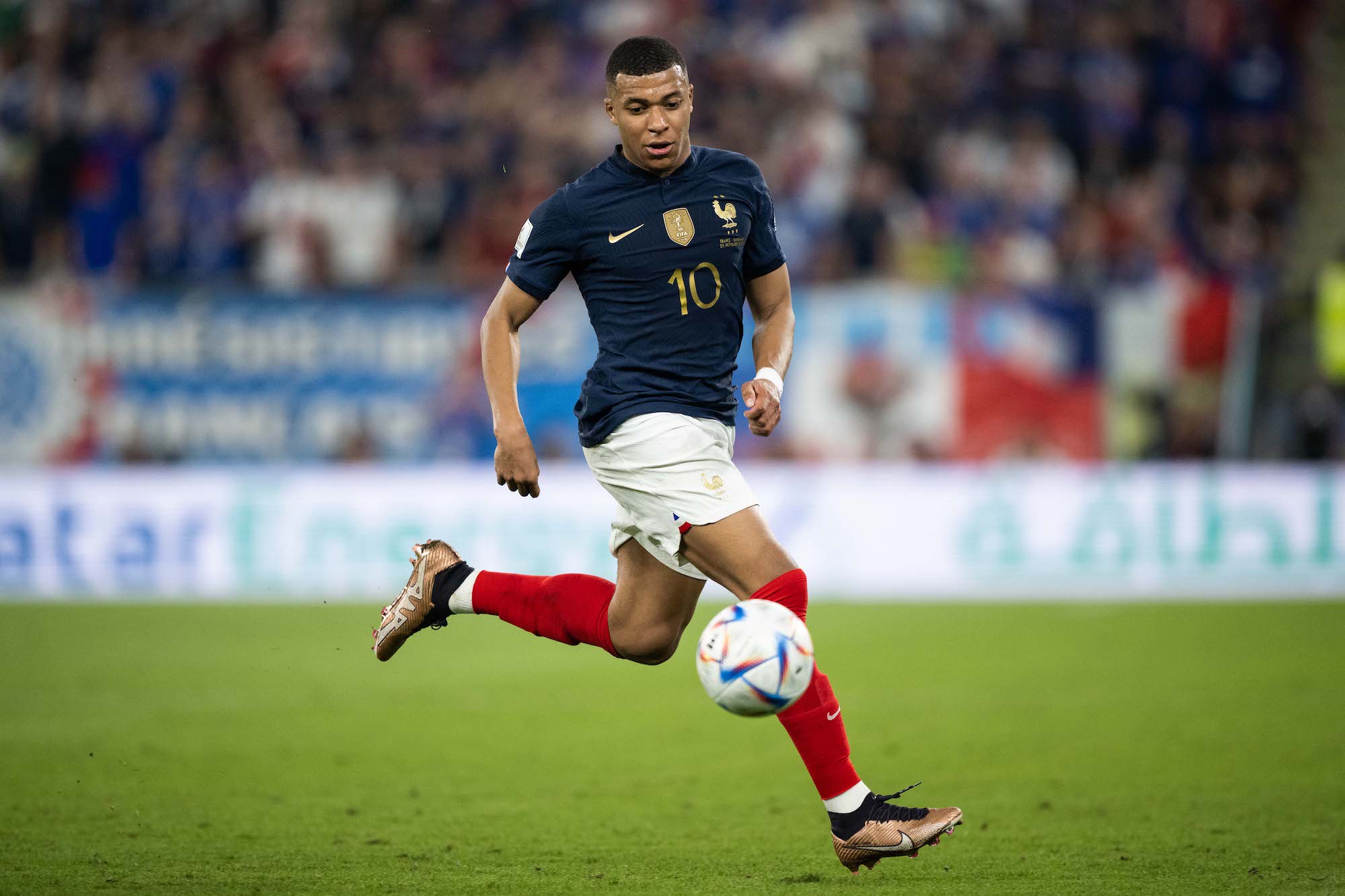 Kylian Mbappé controls the ball during a match against Denmark at Stadium 974 on Saturday.