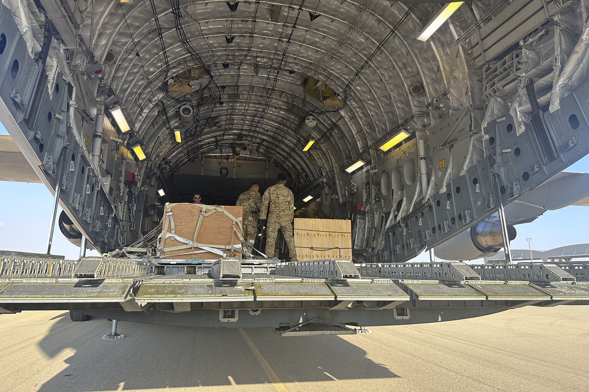 A U.S. C-17 sits at the Nevatim Air Base in the desert in Israel, on October 13. The aircraft arrived with crates of American munitions for Israel. 