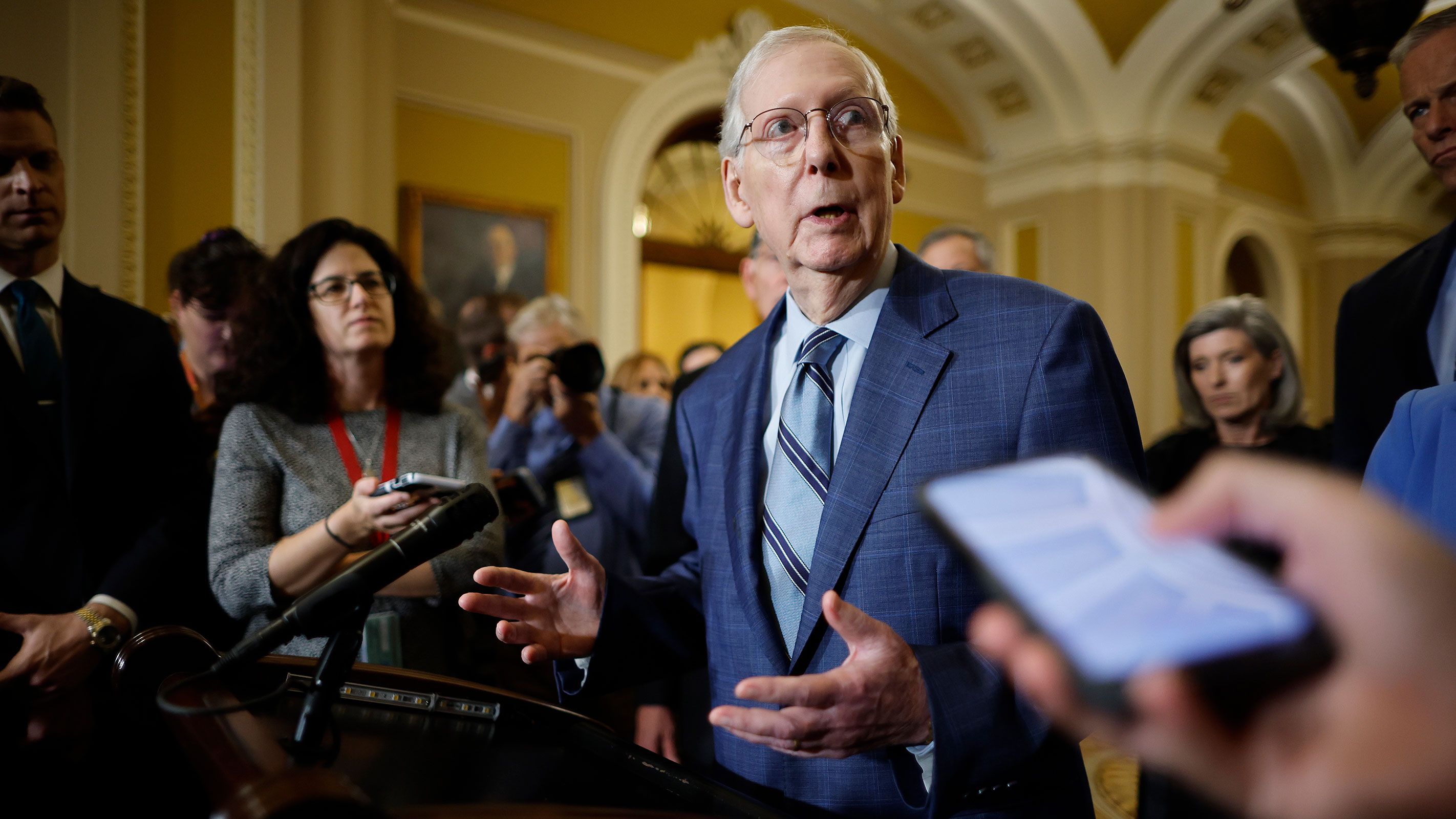 Senate Minority Leader Mitch McConnell talks to reporters following the weekly Republican Senate policy luncheon meeting at the Capitol on September 12 in Washington, DC. 