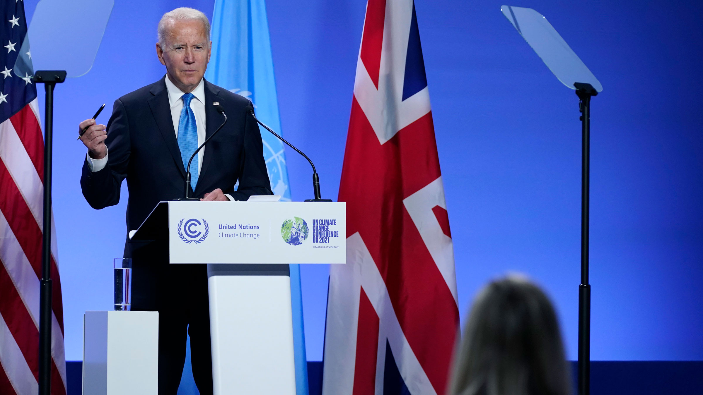 President Joe Biden speaks during a news conference at the COP26 summit on Tuesday.