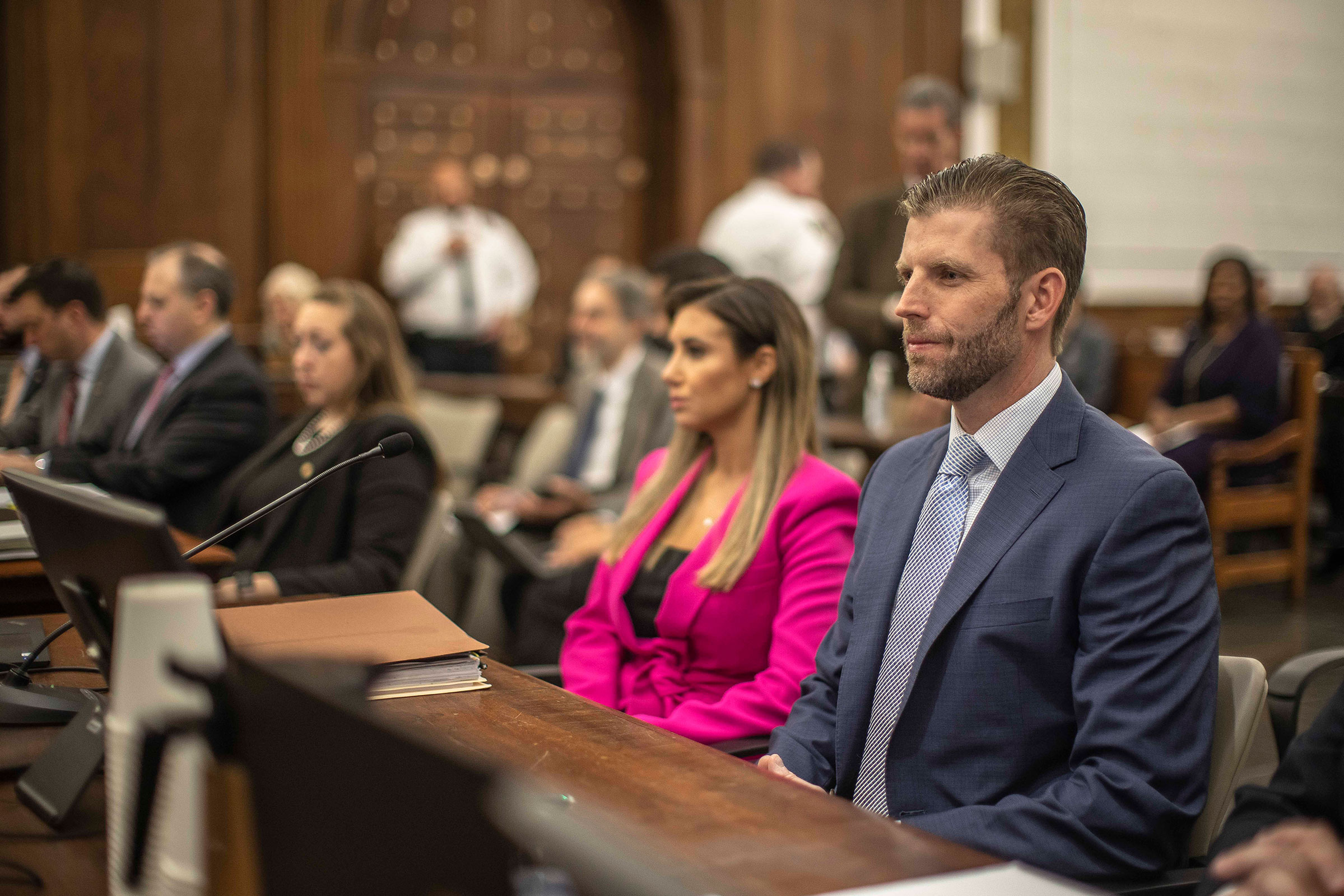 Eric Trump, son of former President Donald Trump, right, waits to testify at New York State Supreme Court on Friday, November 3.