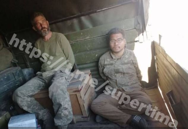 Missing Americans Alexander John-Robert Drueke (left) and Andy Tai Ngoc Huynh appeared in this undated photo posted on Telegram on Thursday by a Russian blogger.