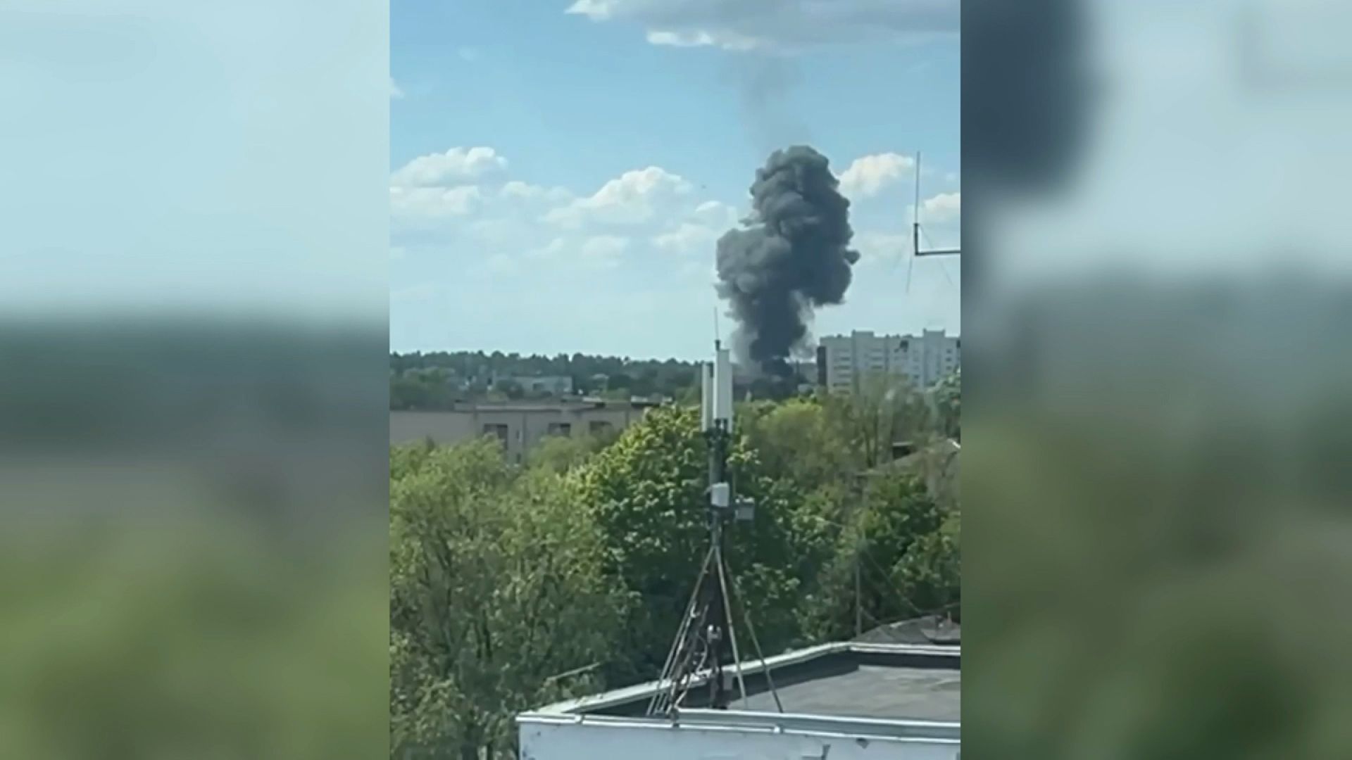 Smoke rises after a SU-34 warplane crashed in Bryansk, Russia, on May 13. 
