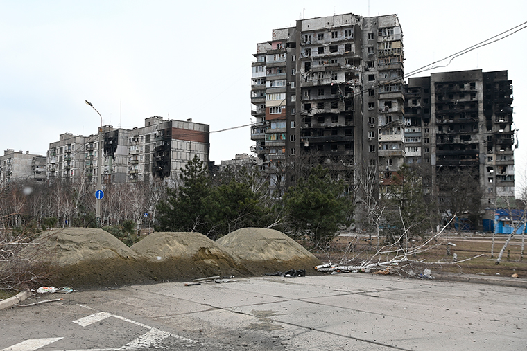Residential buildings damaged by rocket and air strikes are seen in Mariupol, Ukraine on Thursday, March 17. 