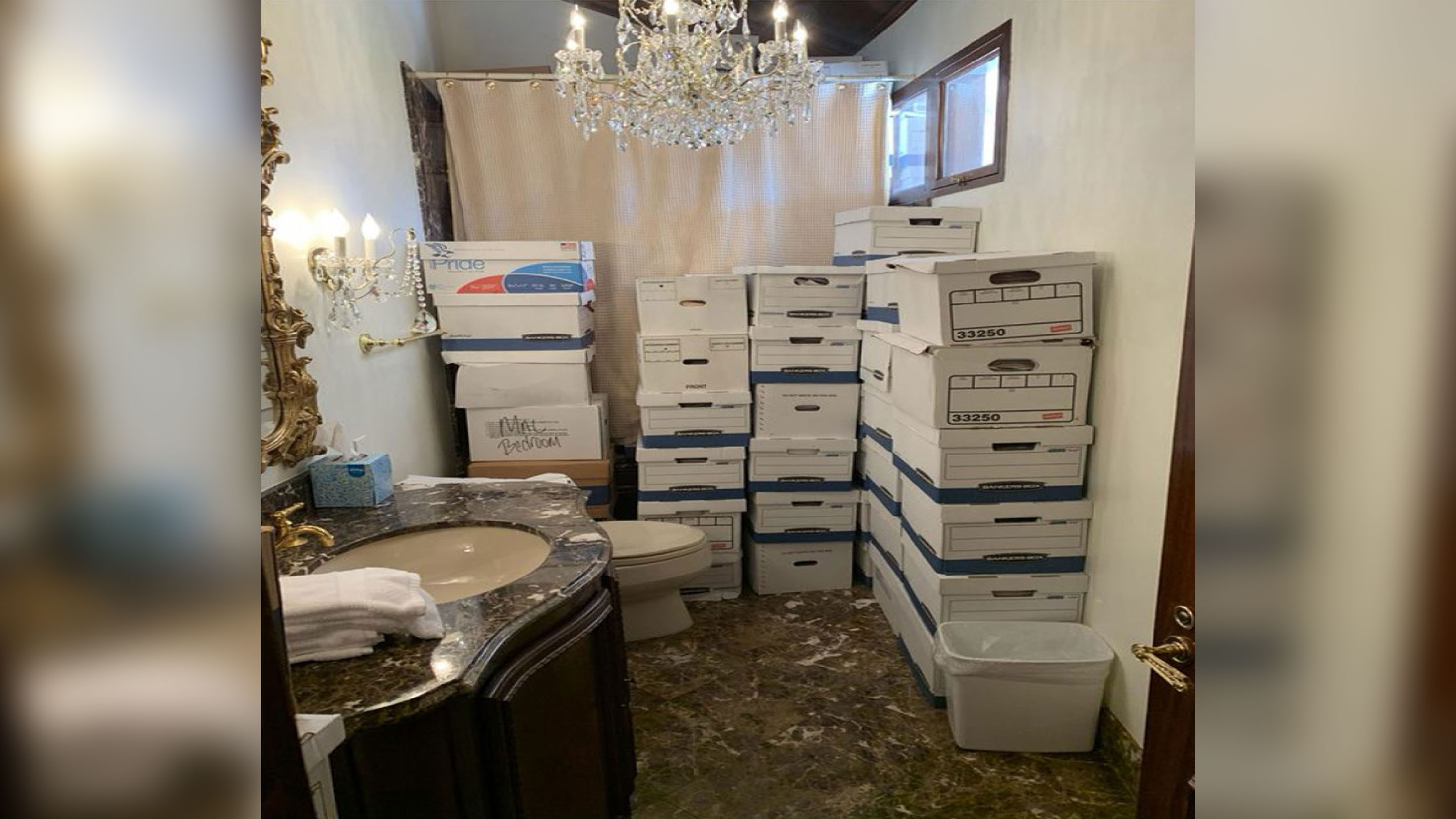 Boxes of classified documents are stored inside a bathroom inside the Mar-a-Lago Club's Lake Room.