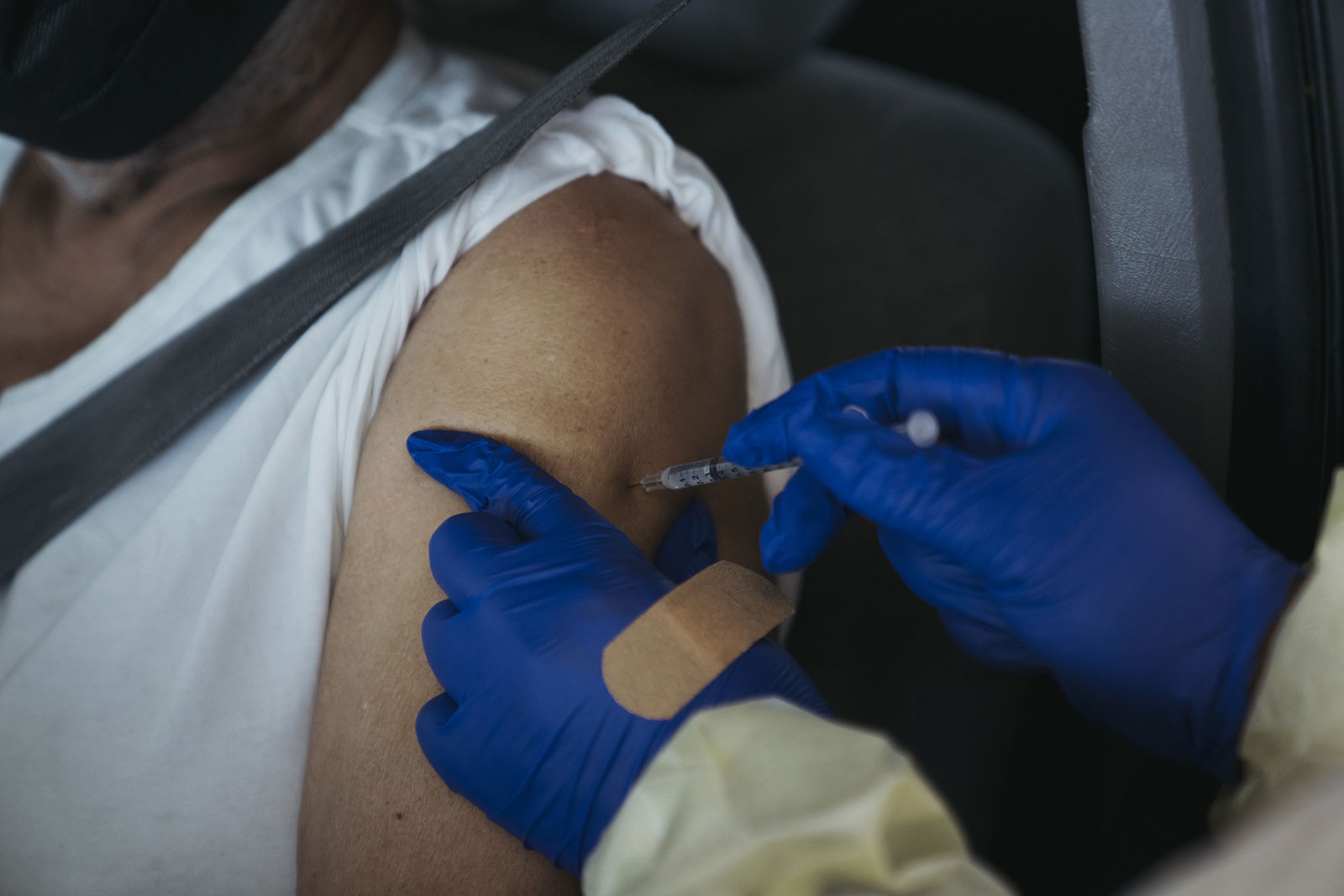 A person receives a dose of a Covid-19 vaccine in Inglewood, California, on February 26.