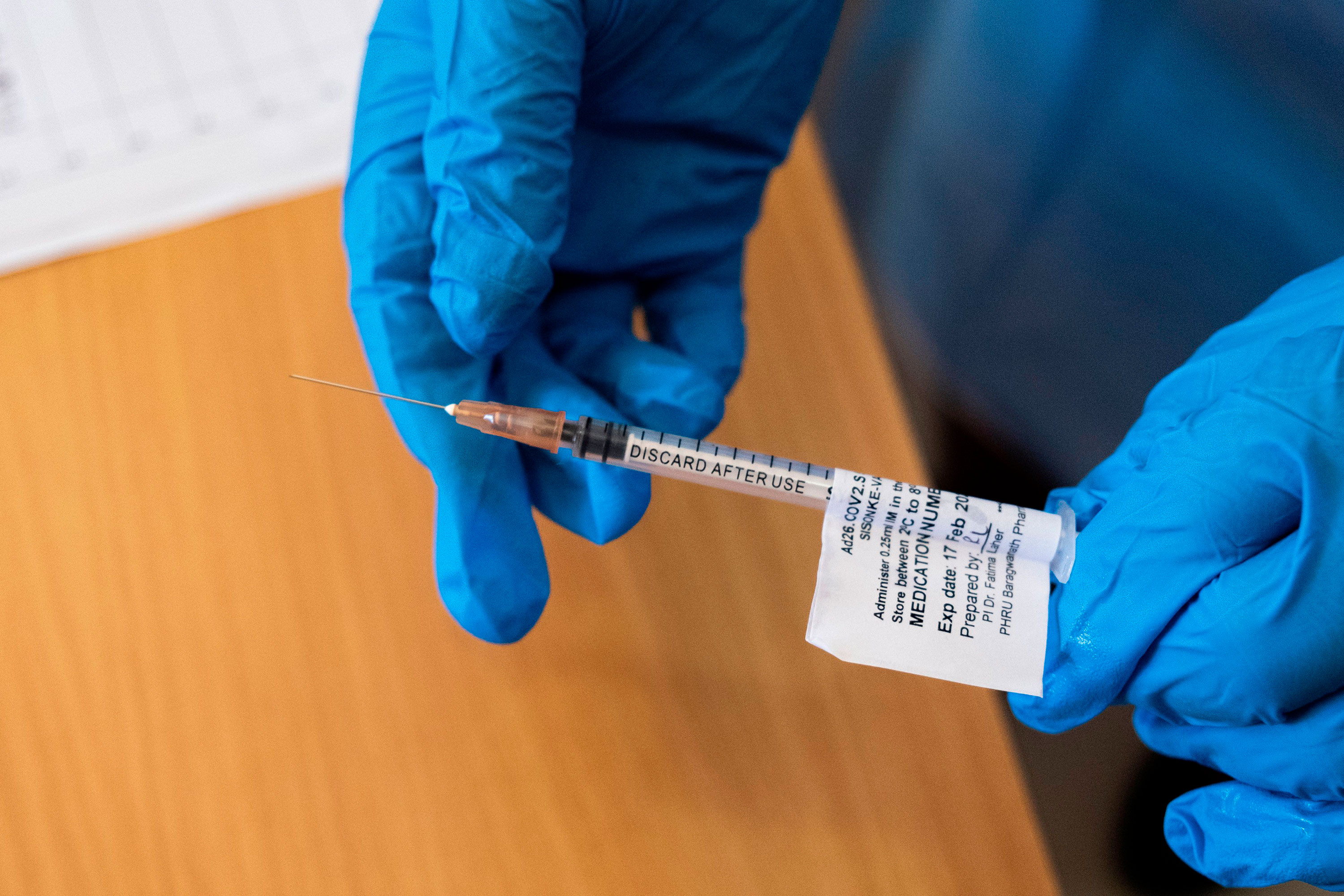 A health worker holds the Johnson and Johnson Covid-19 vaccine in Soweto. South Africa, on February 17.
