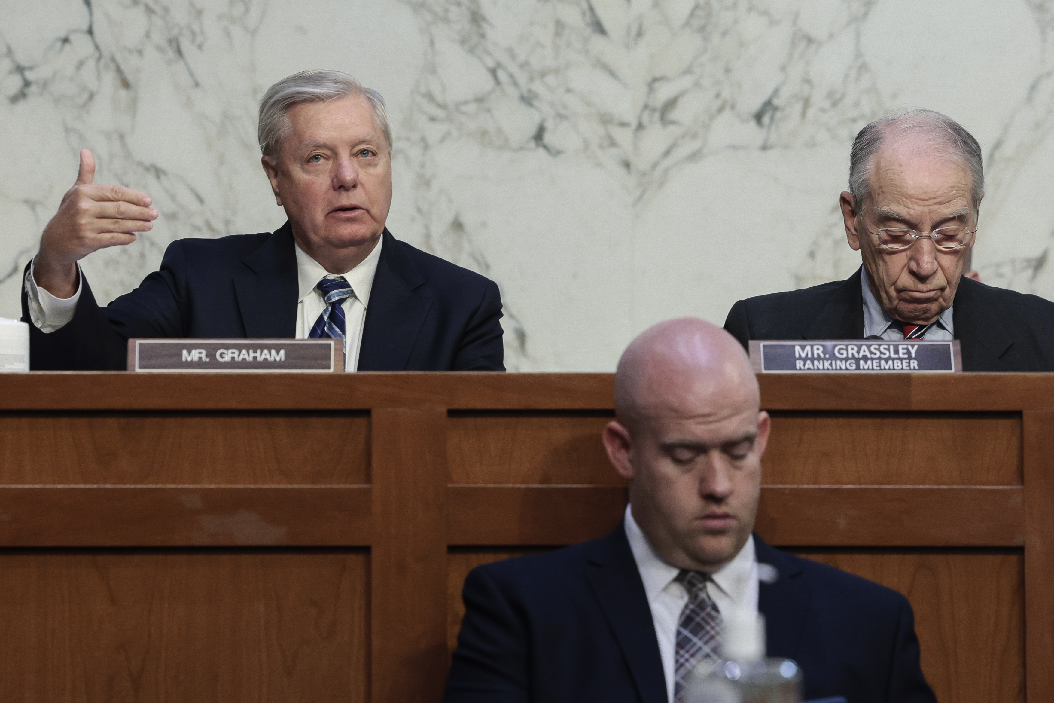 Sen. Lindsey Graham, a Republican from South Carolina, left, during a Senate Judiciary Committee business meeting to vote on Supreme Court nominee Judge Ketanji Brown Jackson on April 4. 