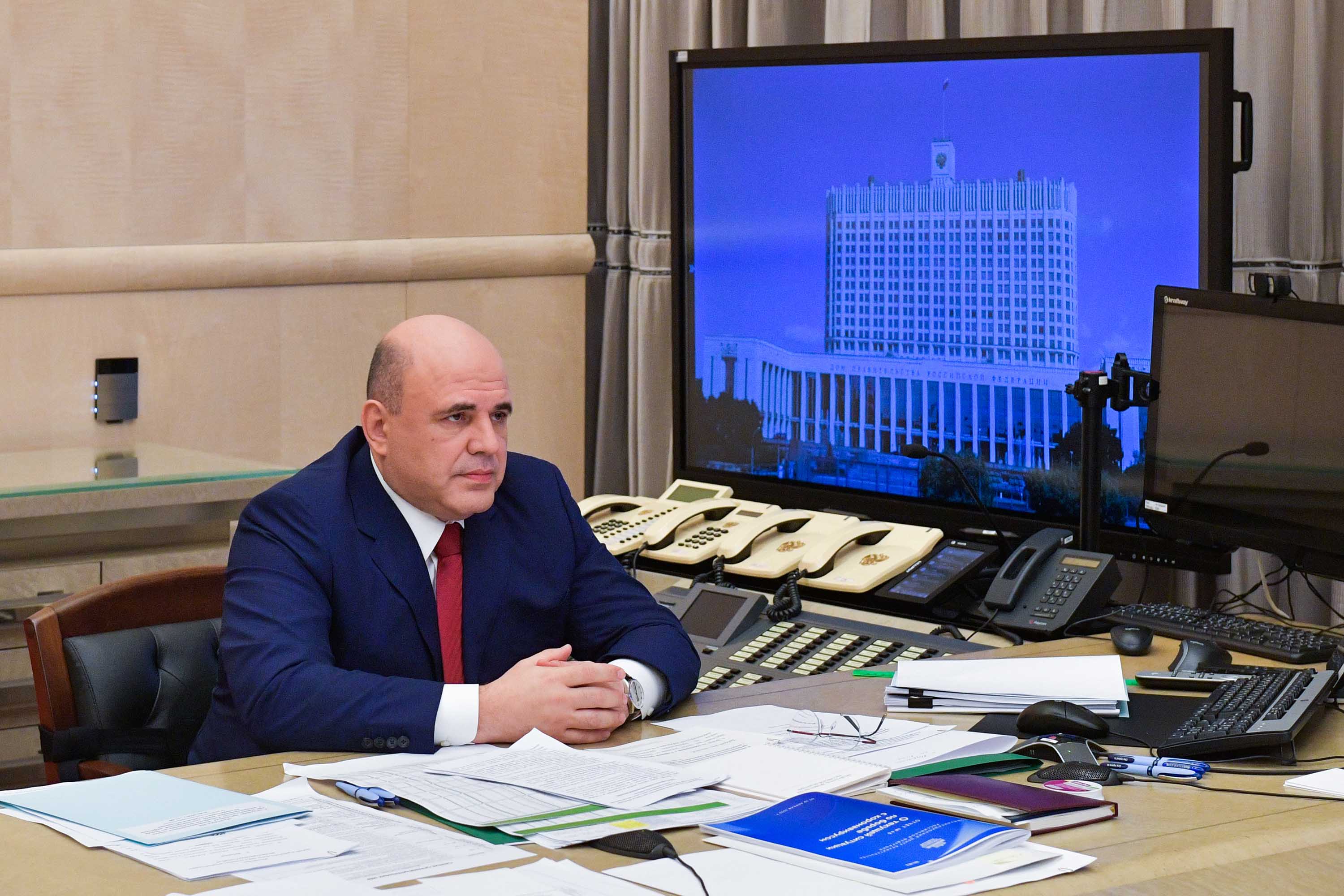 Russia's Prime Minister Mikhail Mishustin chairs a meeting via video link in Moscow on April 29.